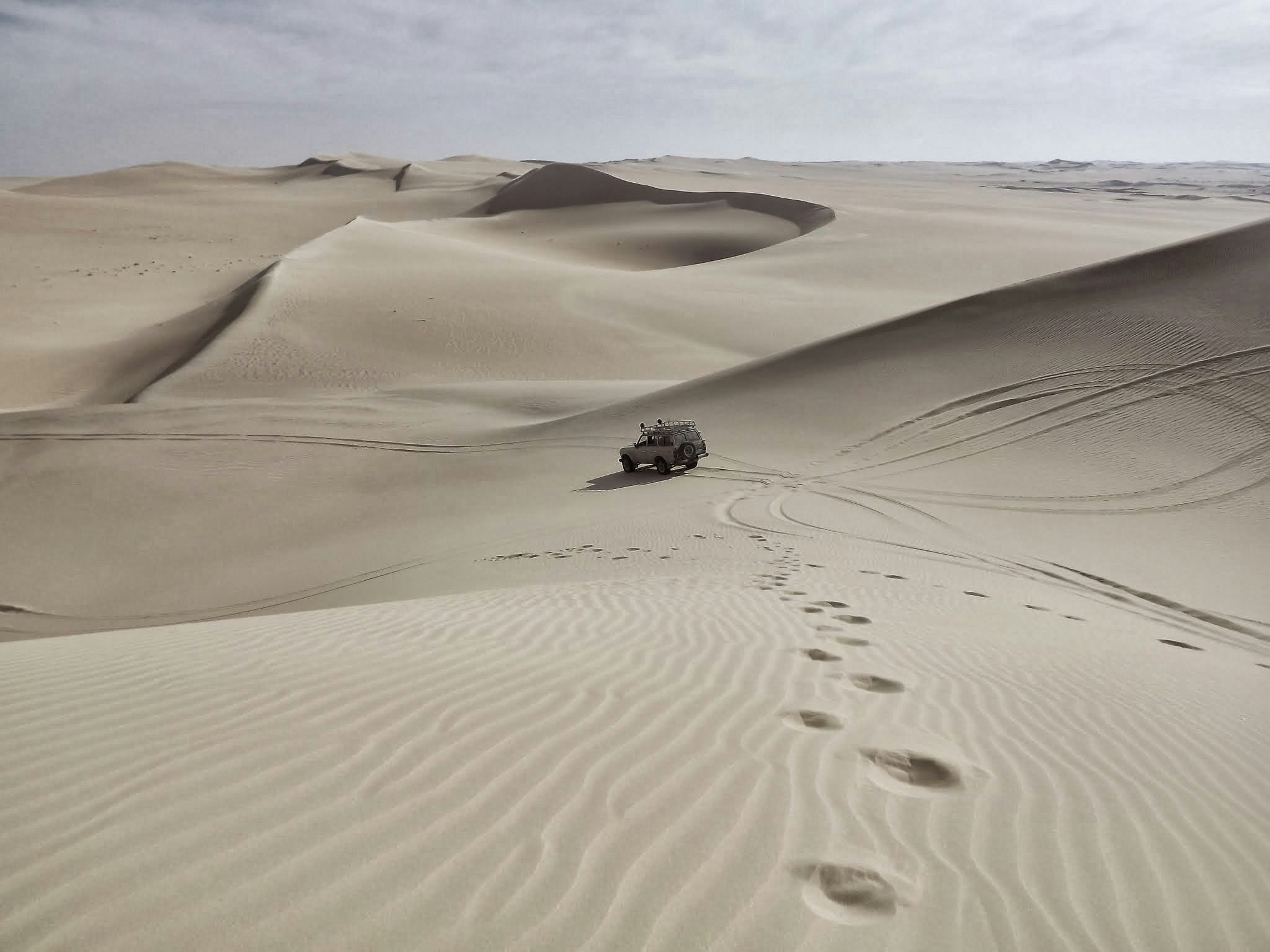 Off-road Vehicle on Desert Sand Dunes
