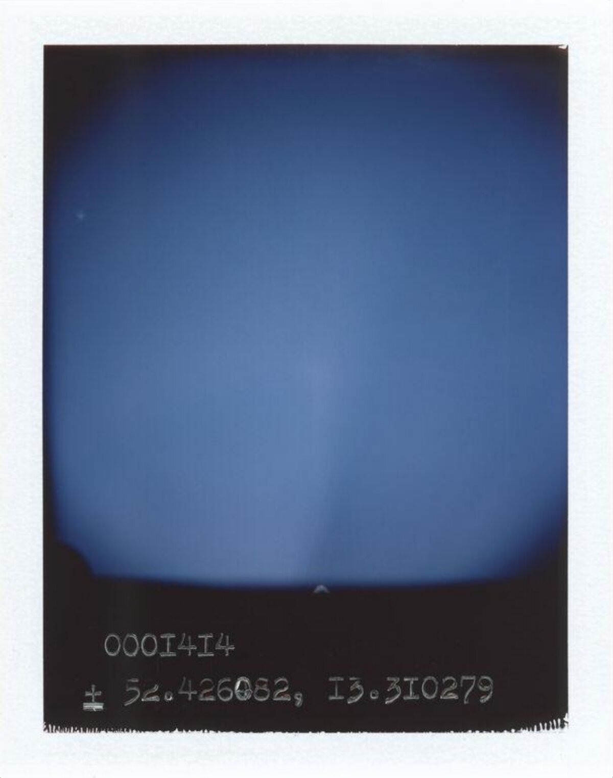 Blue Sky Polaroid with Handwritten Coordinates