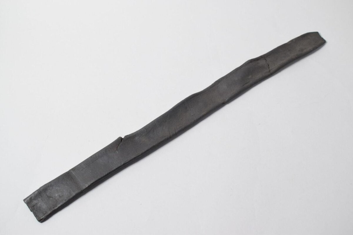 Black Charcoal Strip on White Background