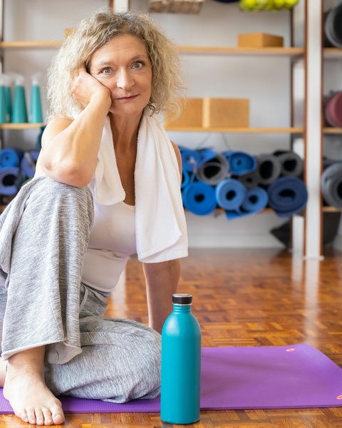 Mature Woman Resting After Yoga