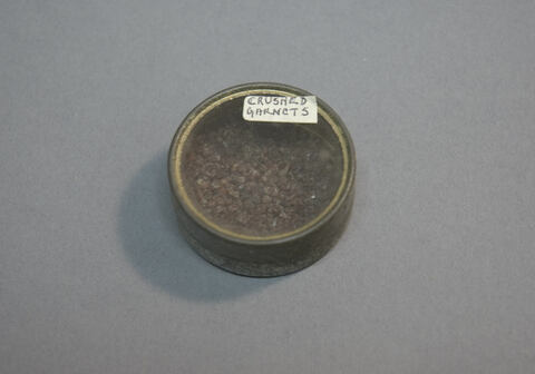 Crushed Garnets in Sample Container