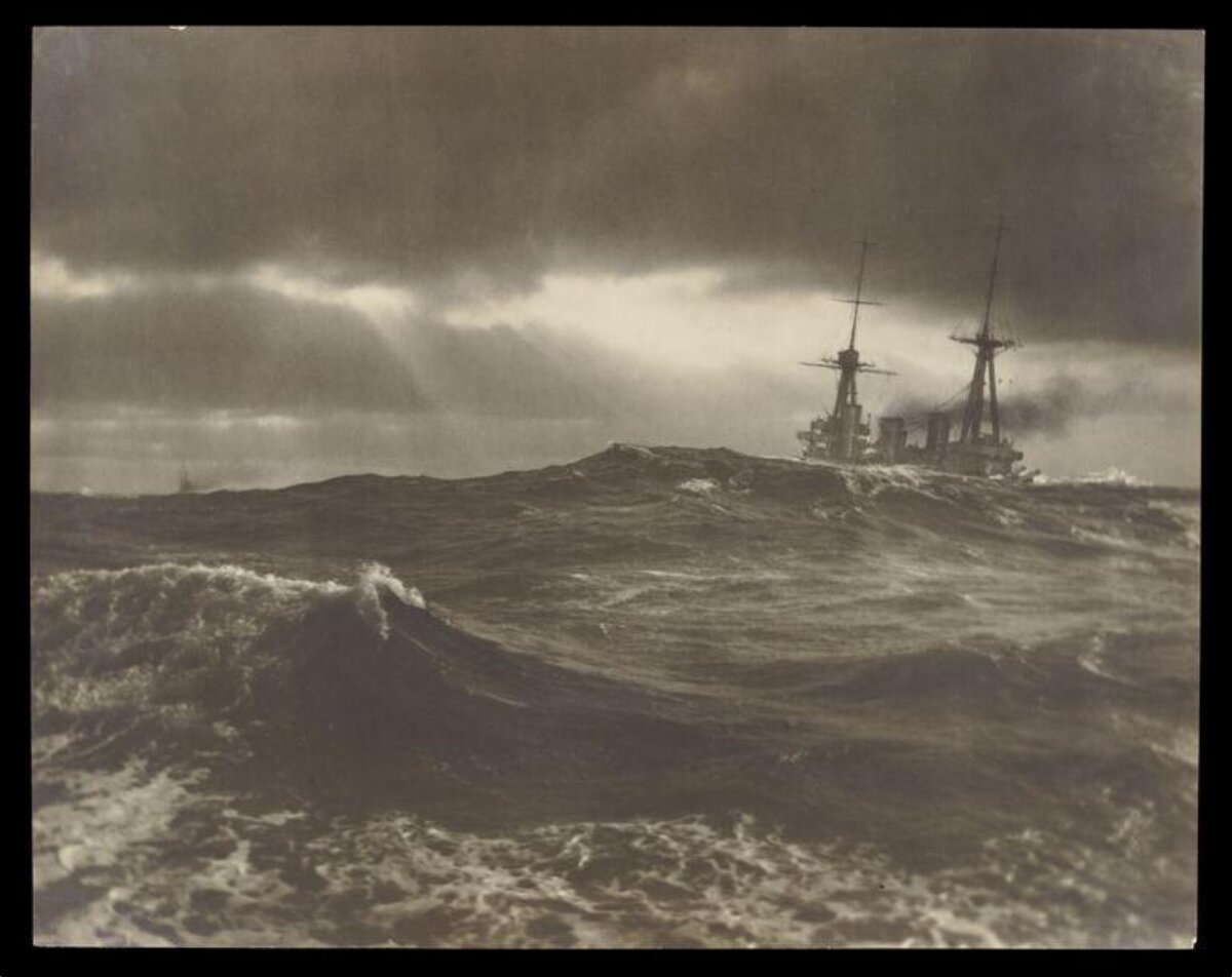 Battleship Sailing Through Stormy Sea