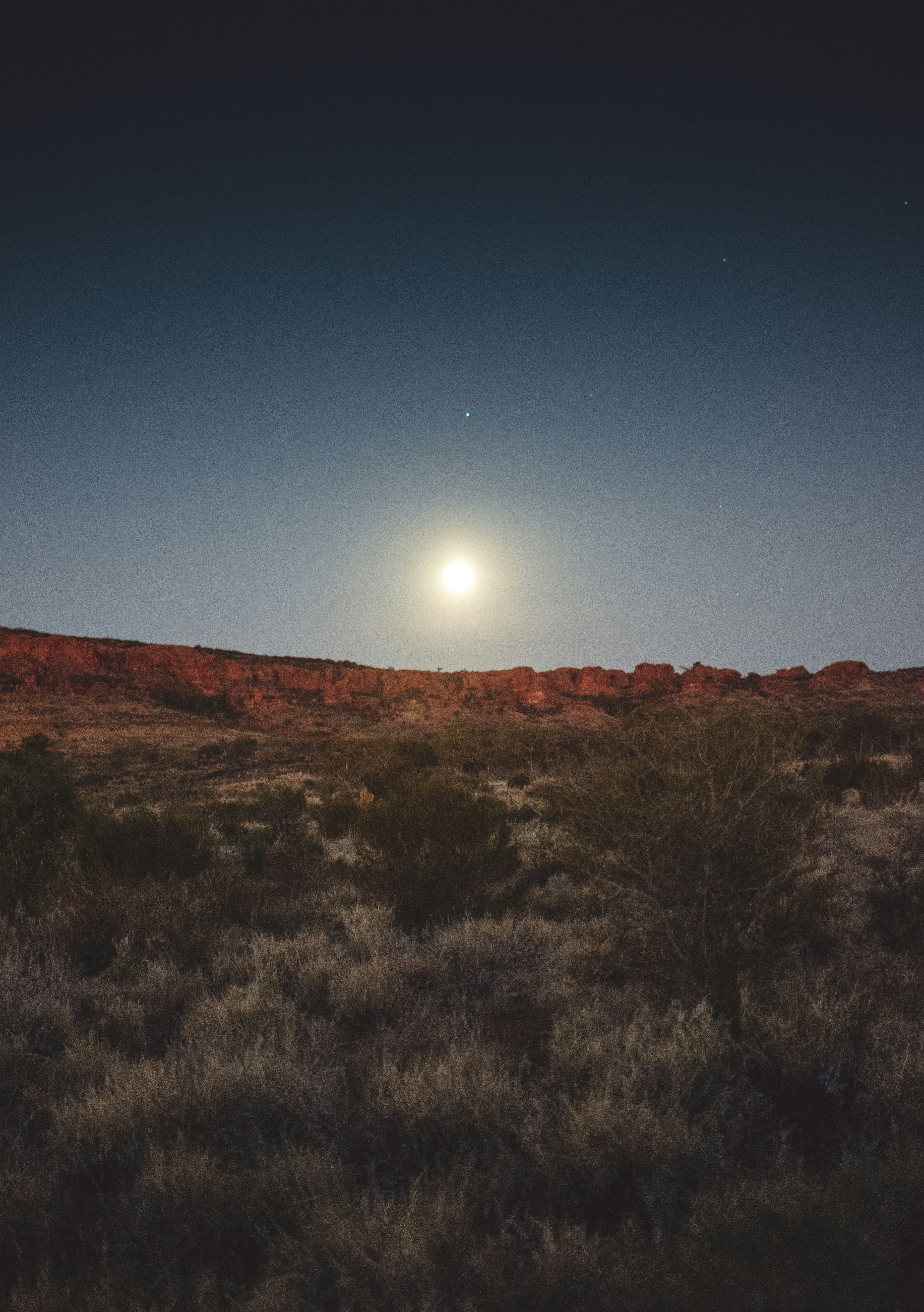 Moonrise Over Desert Red Cliffs