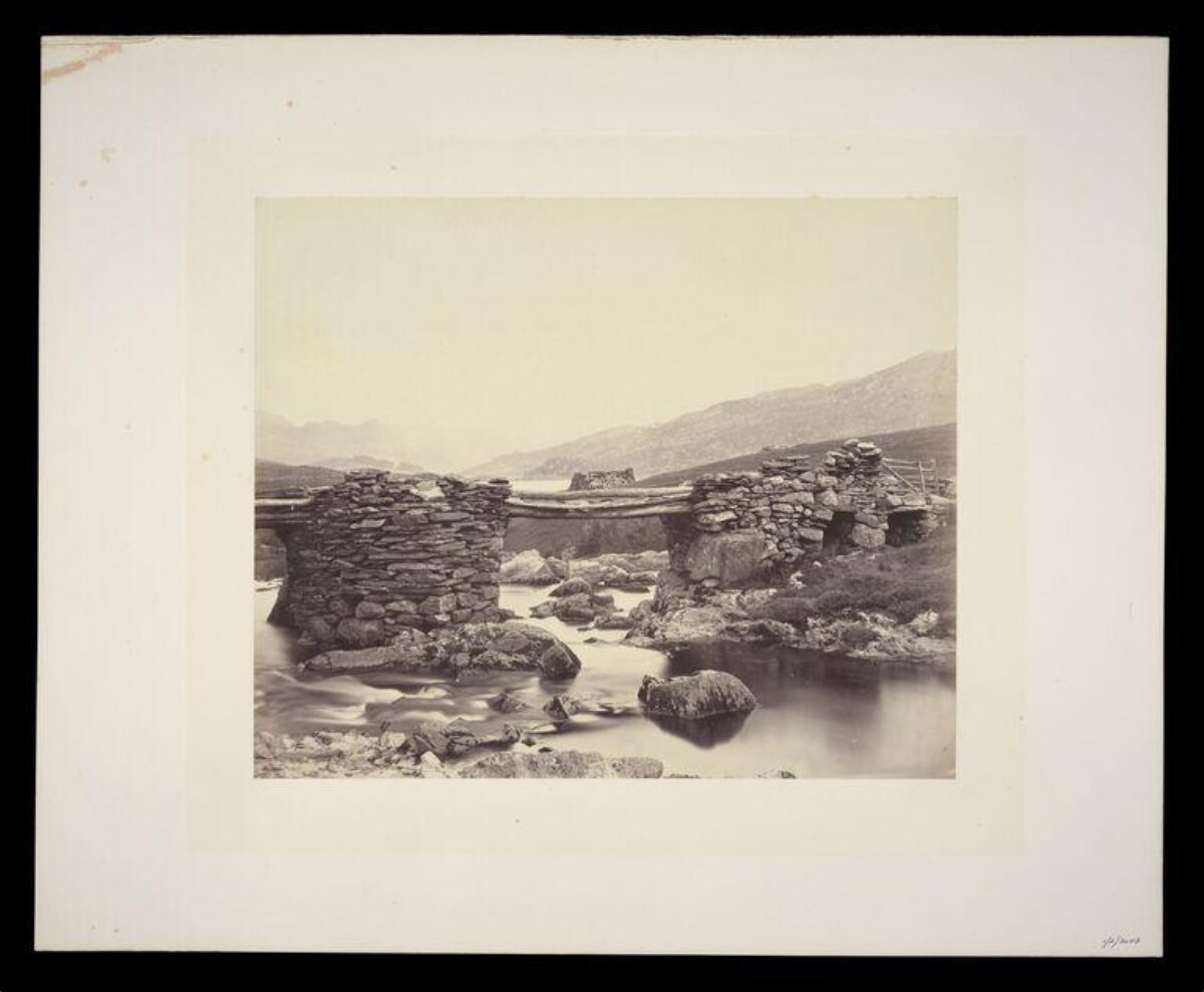 Old Stone Bridge Over Mountain River