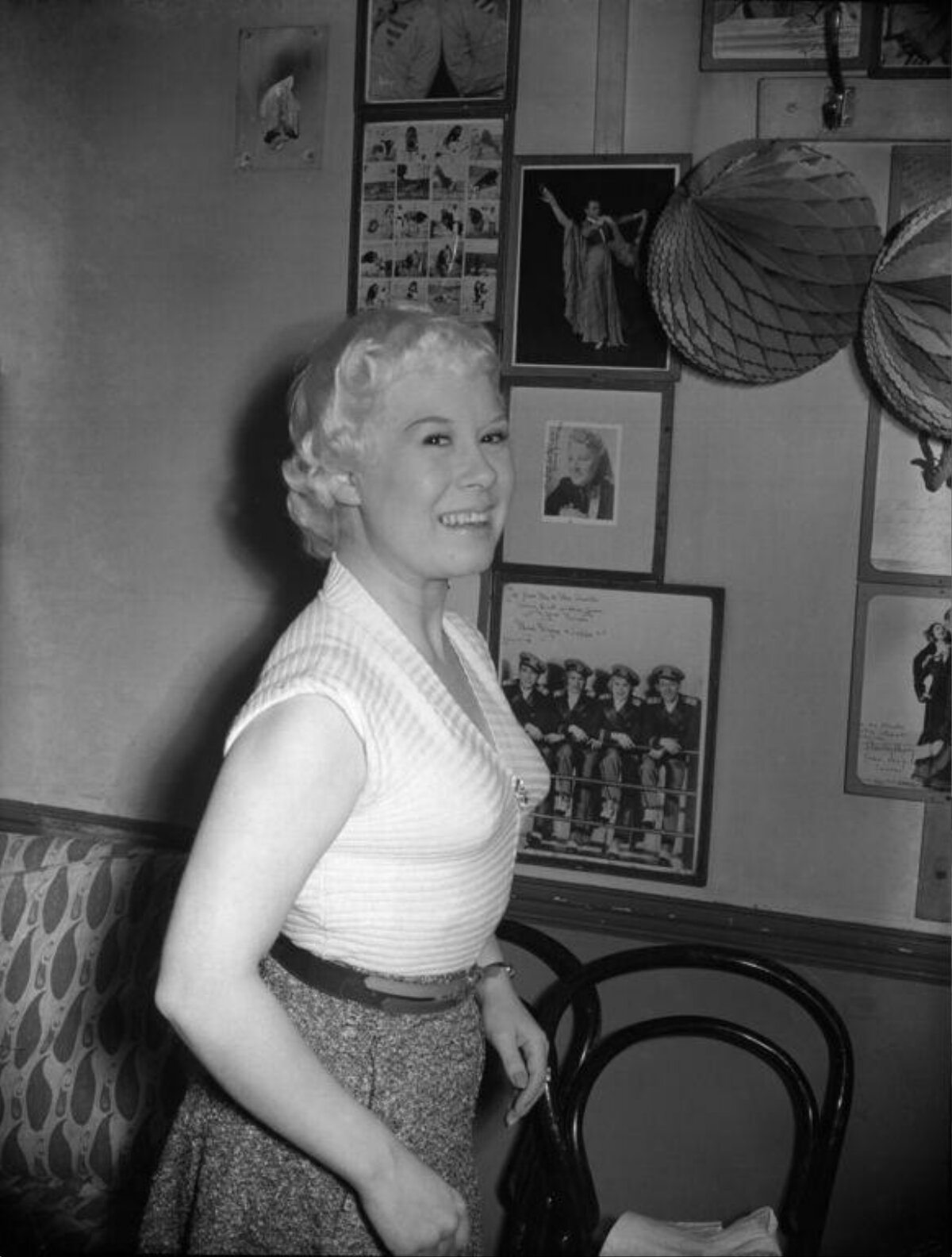 Smiling Blonde Woman in Dressing Room