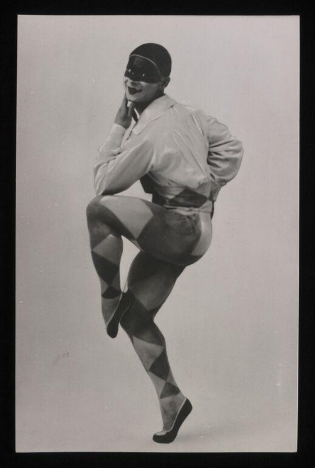 Masked Harlequin Dancer in Pose