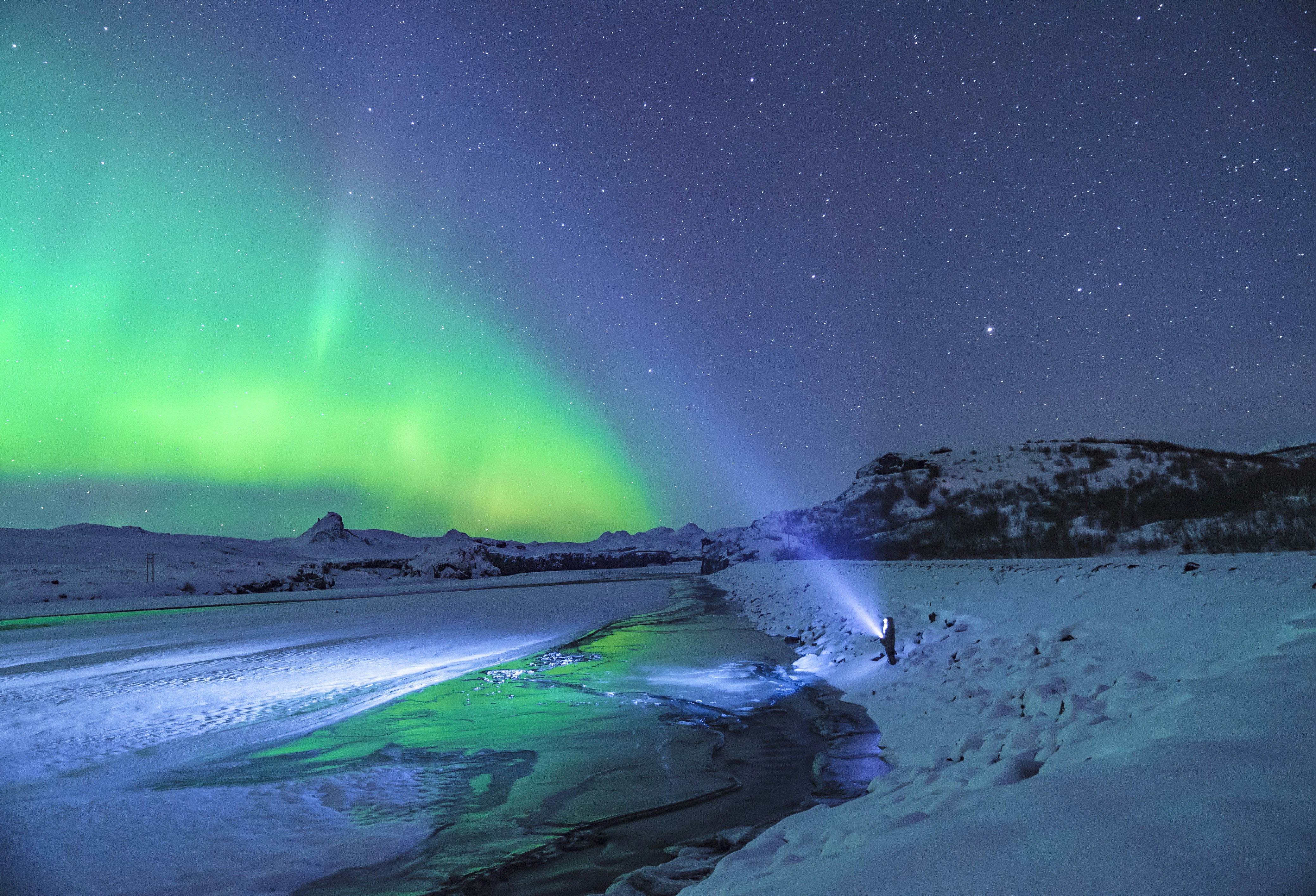 Aurora Over Snowy Frozen River