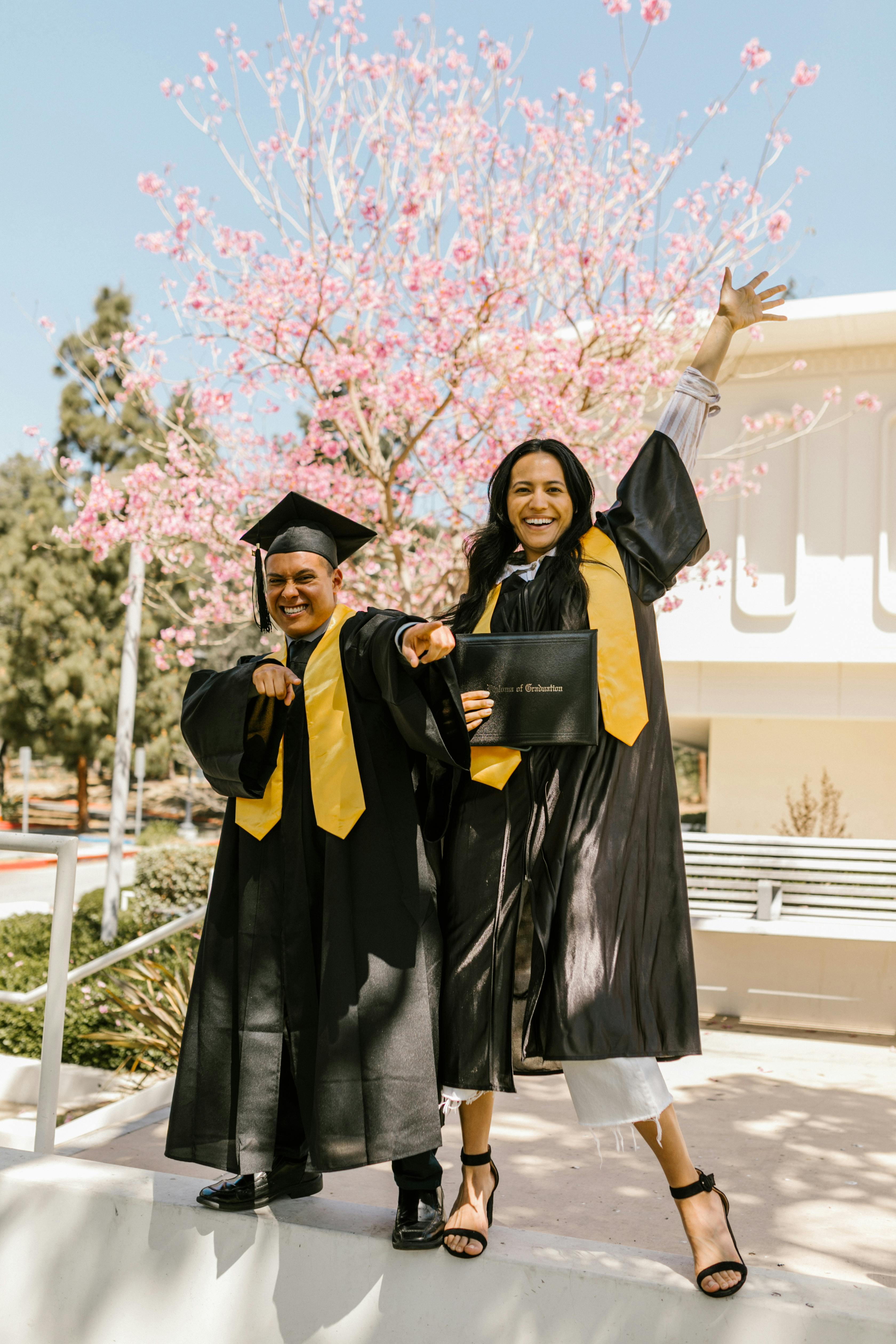 Two Graduates Celebrating Graduation