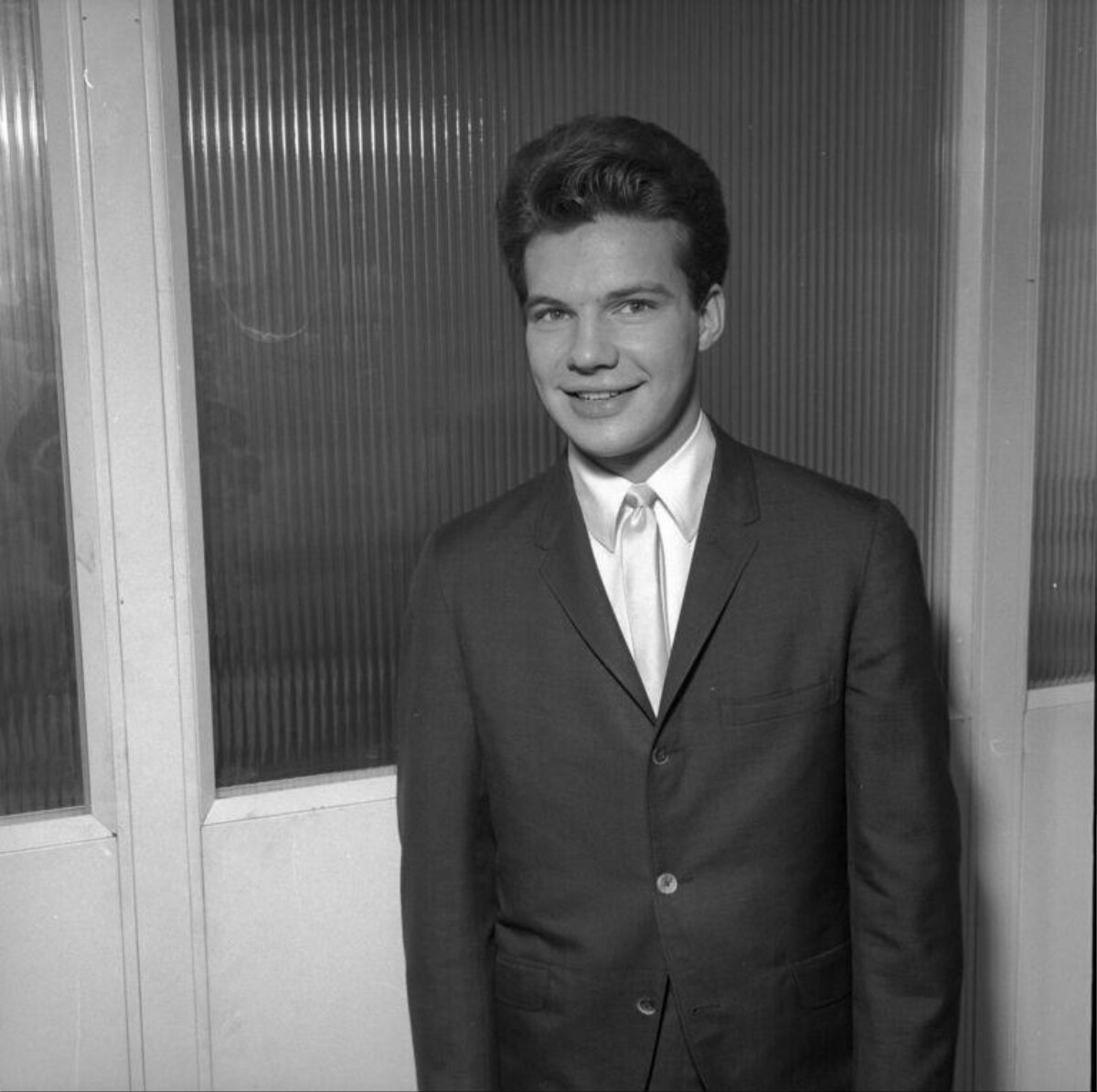 Young Smiling Man in Vintage Suit Portrait