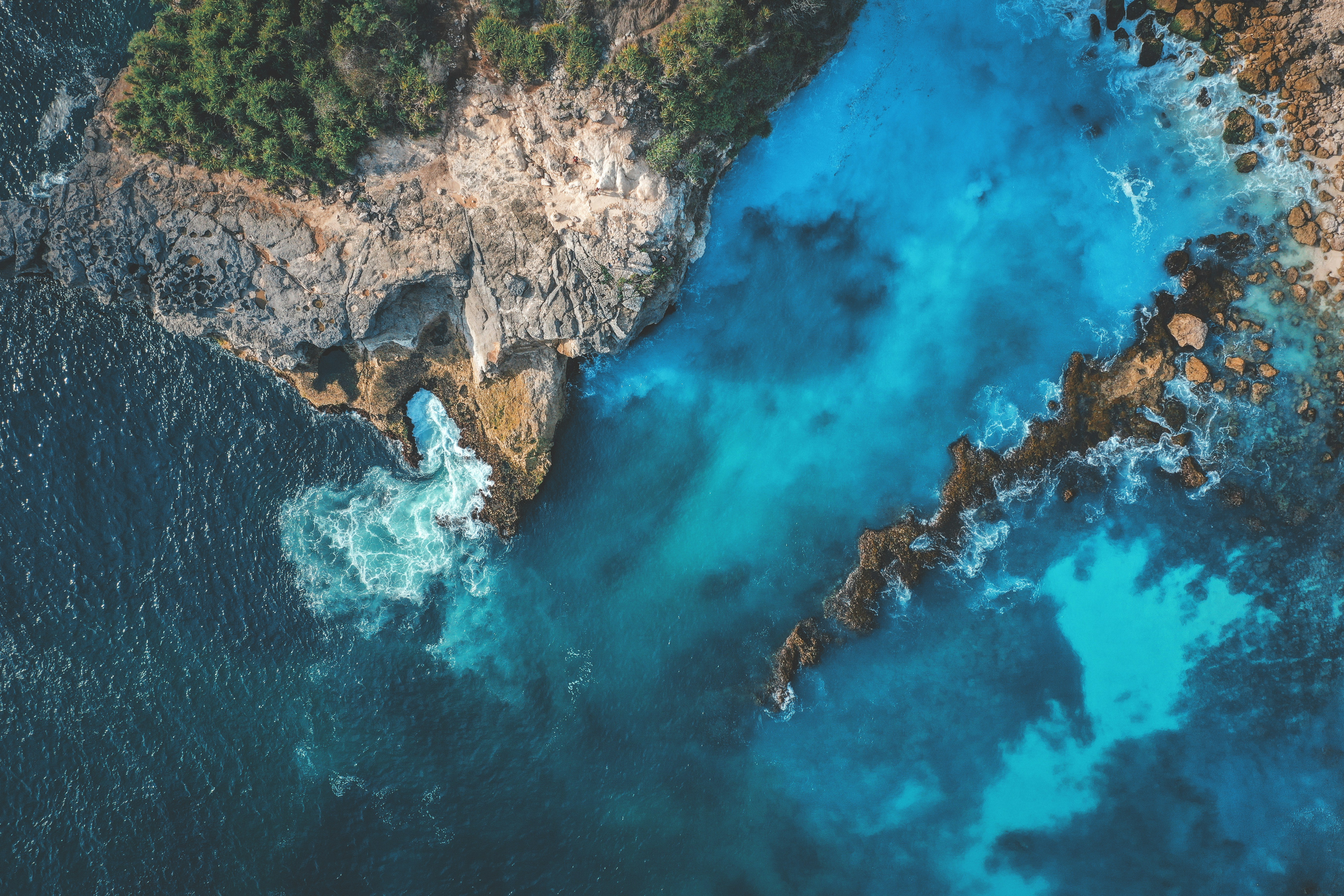 Aerial View of Rocky Coastline Sea