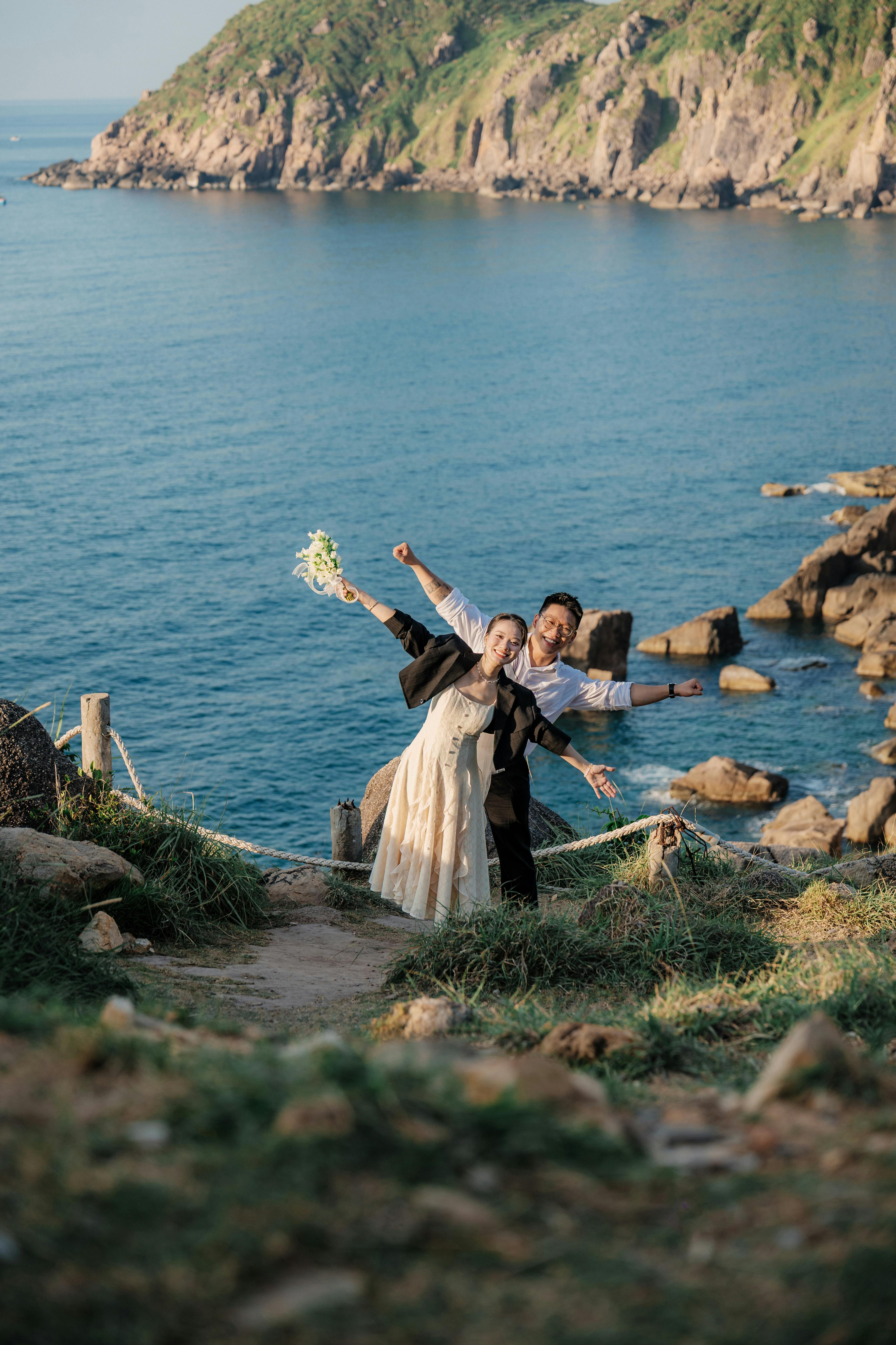 Happy Wedding Couple by the Sea