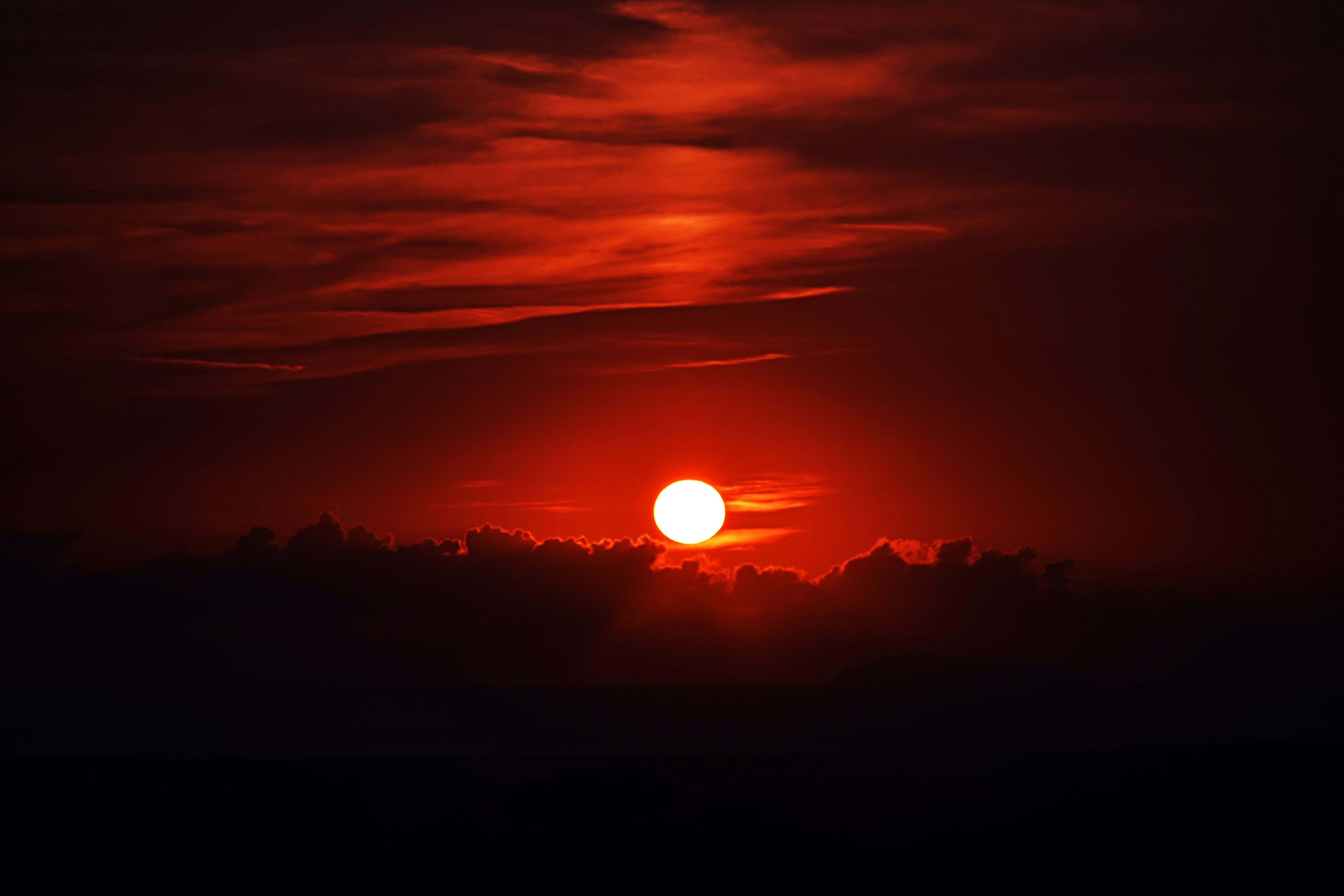 Red Sunset Above Dark Clouds