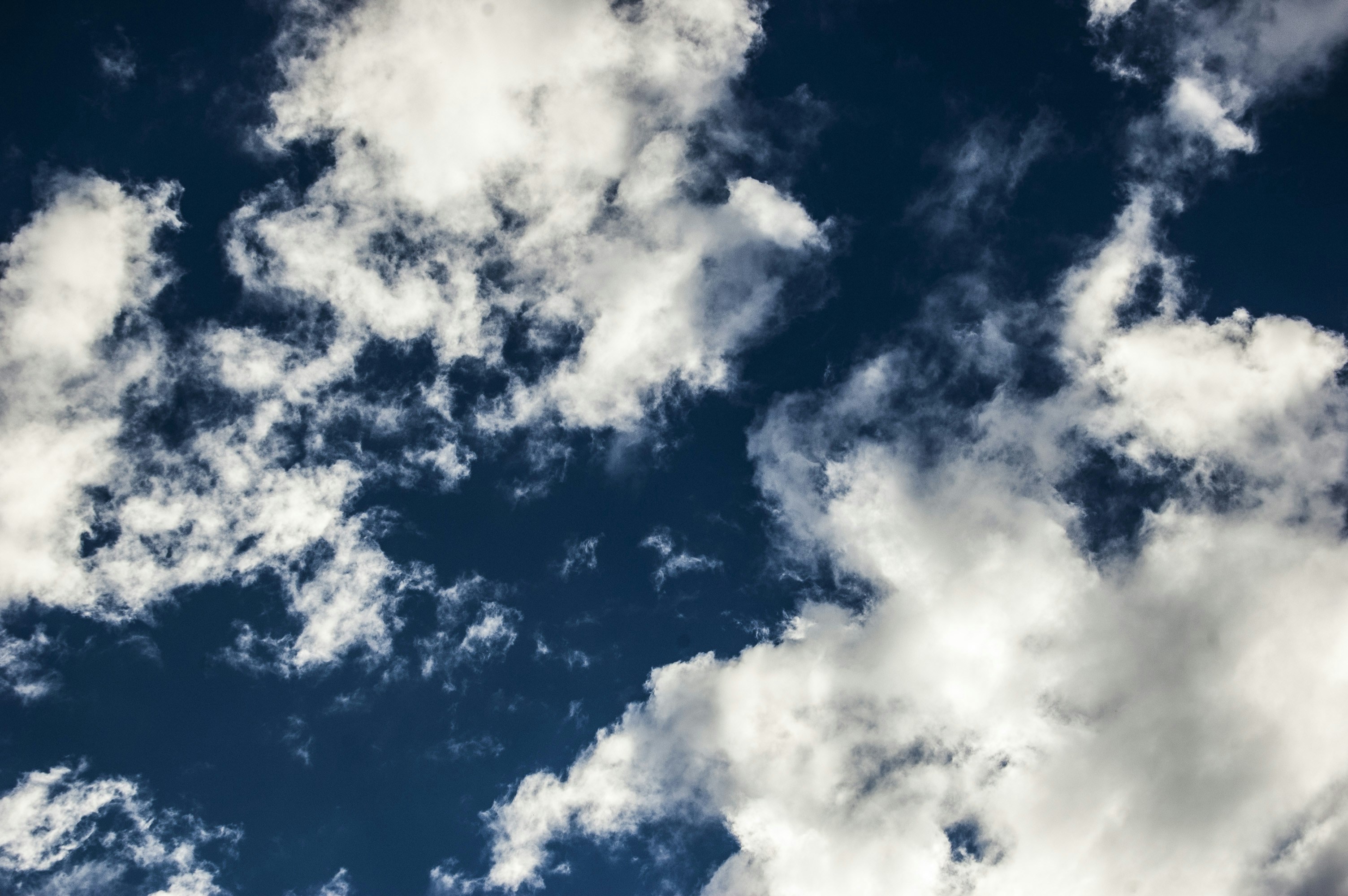 Deep Blue Sky with White Clouds