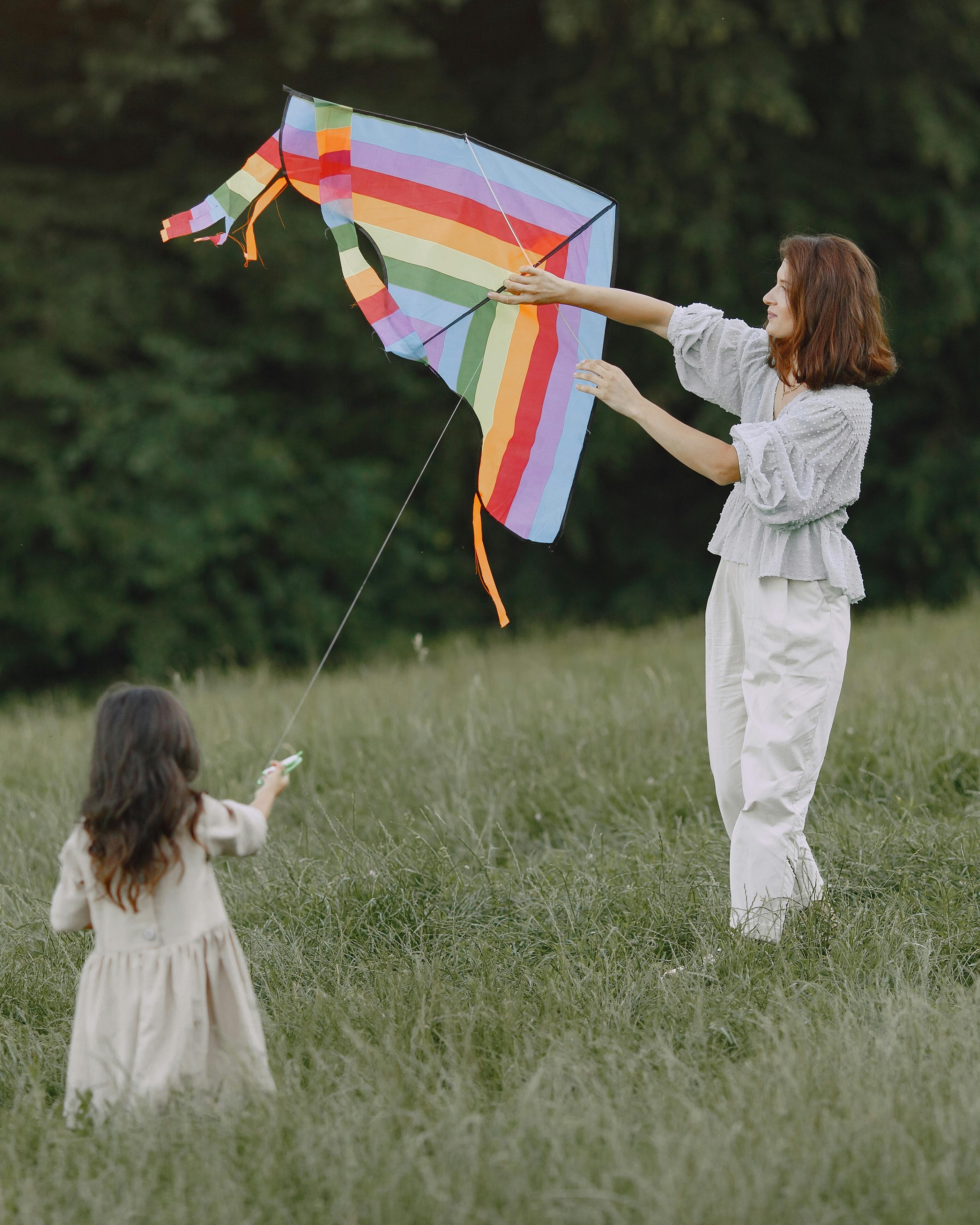 Mother and Daughter Flying Kite
