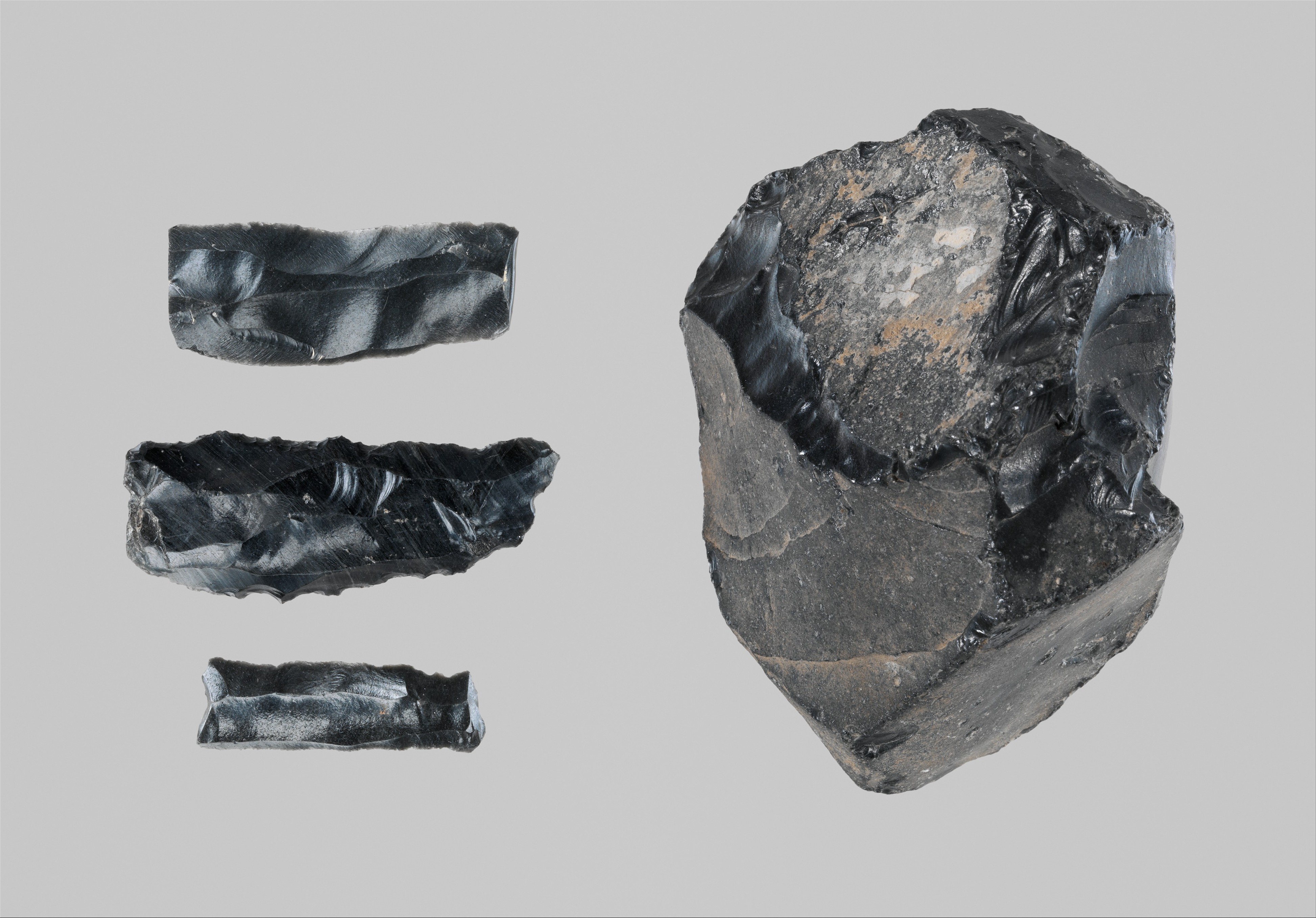Raw and cut obsidian specimens
