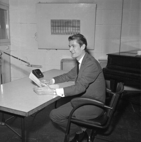 Man Broadcasting in Radio Studio