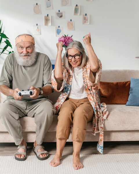 Senior Couple Playing Video Games