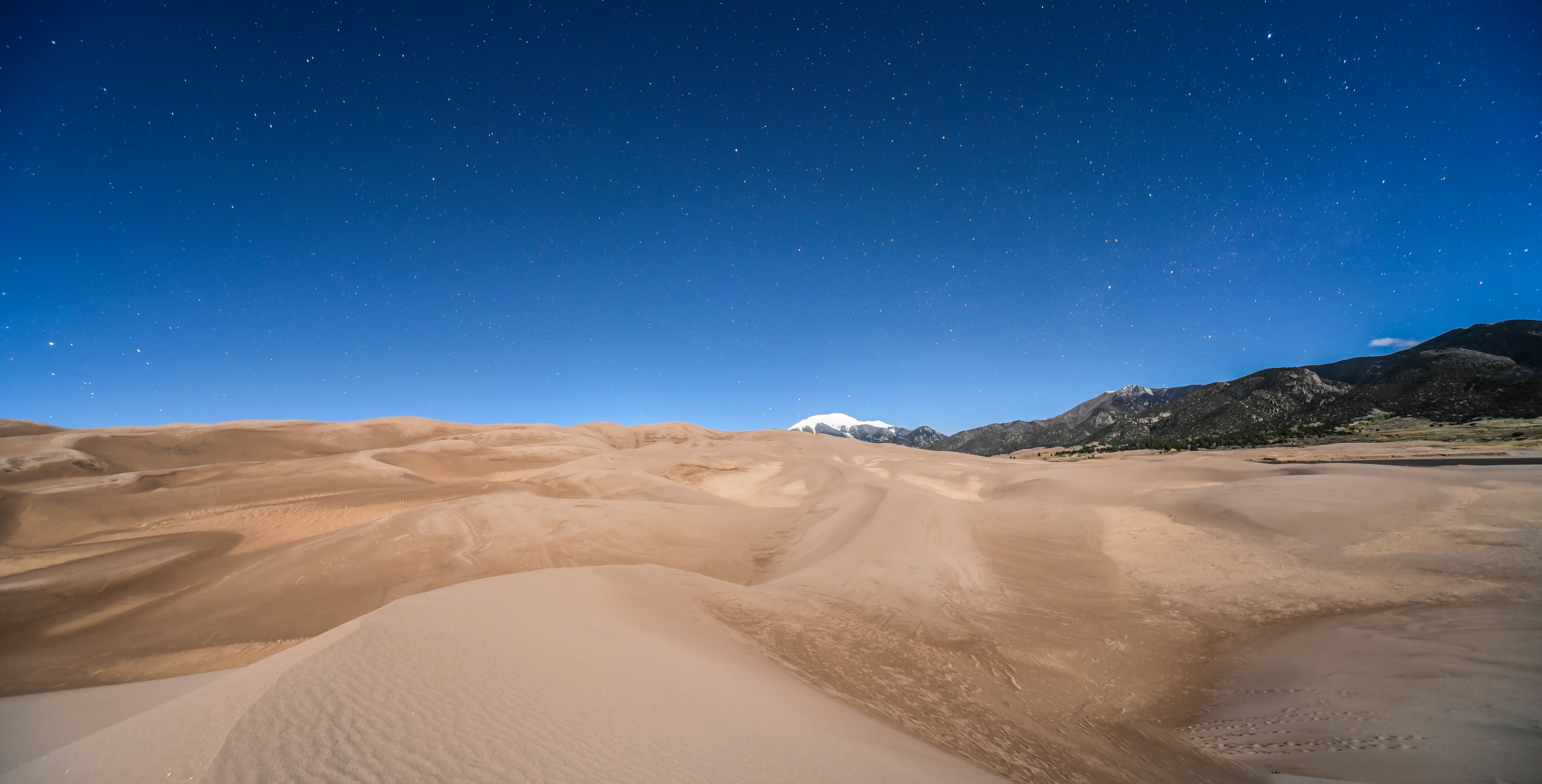 Starry Night over Desert Sand Dunes