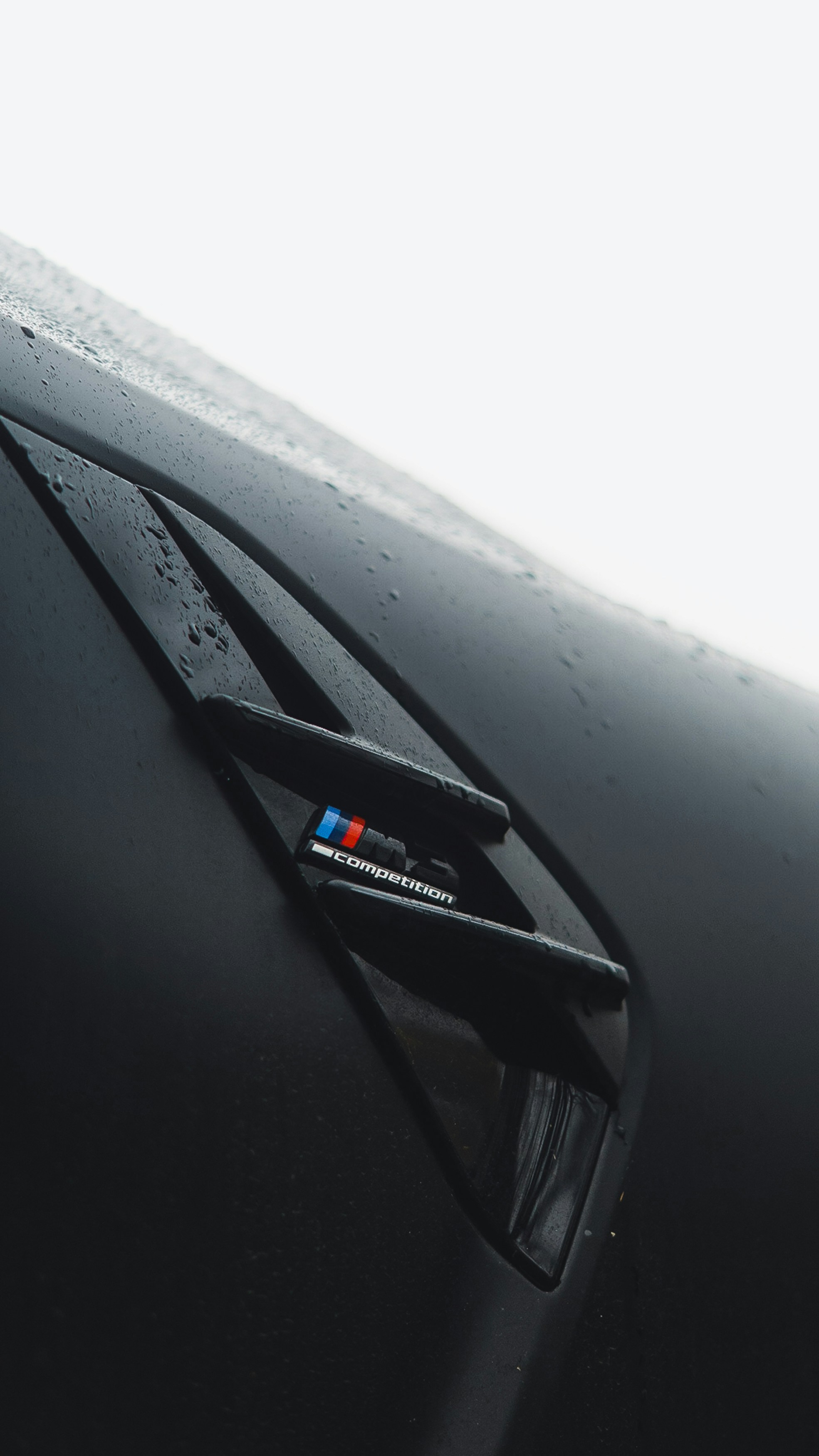 Close-up of BMW M Competition Badge