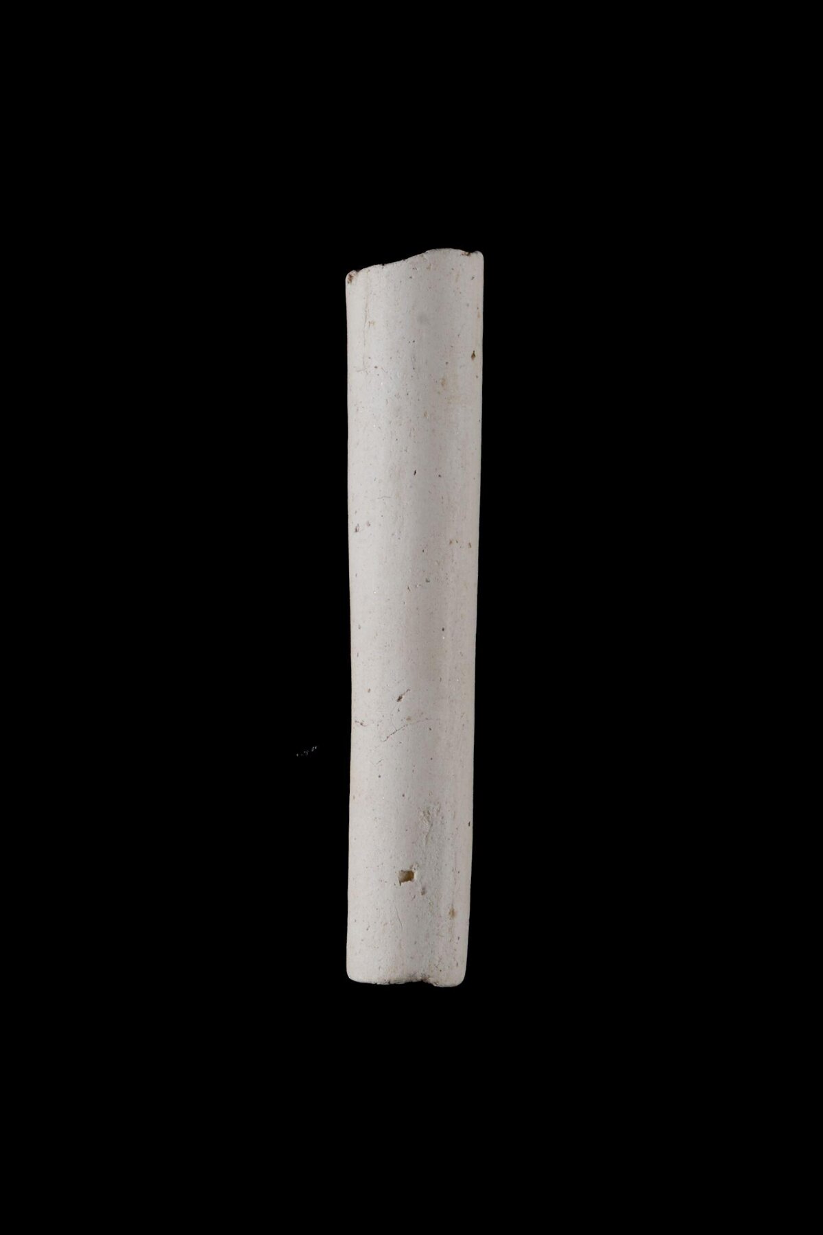 White Cylindrical Object on Black Background — Black Backgrounds