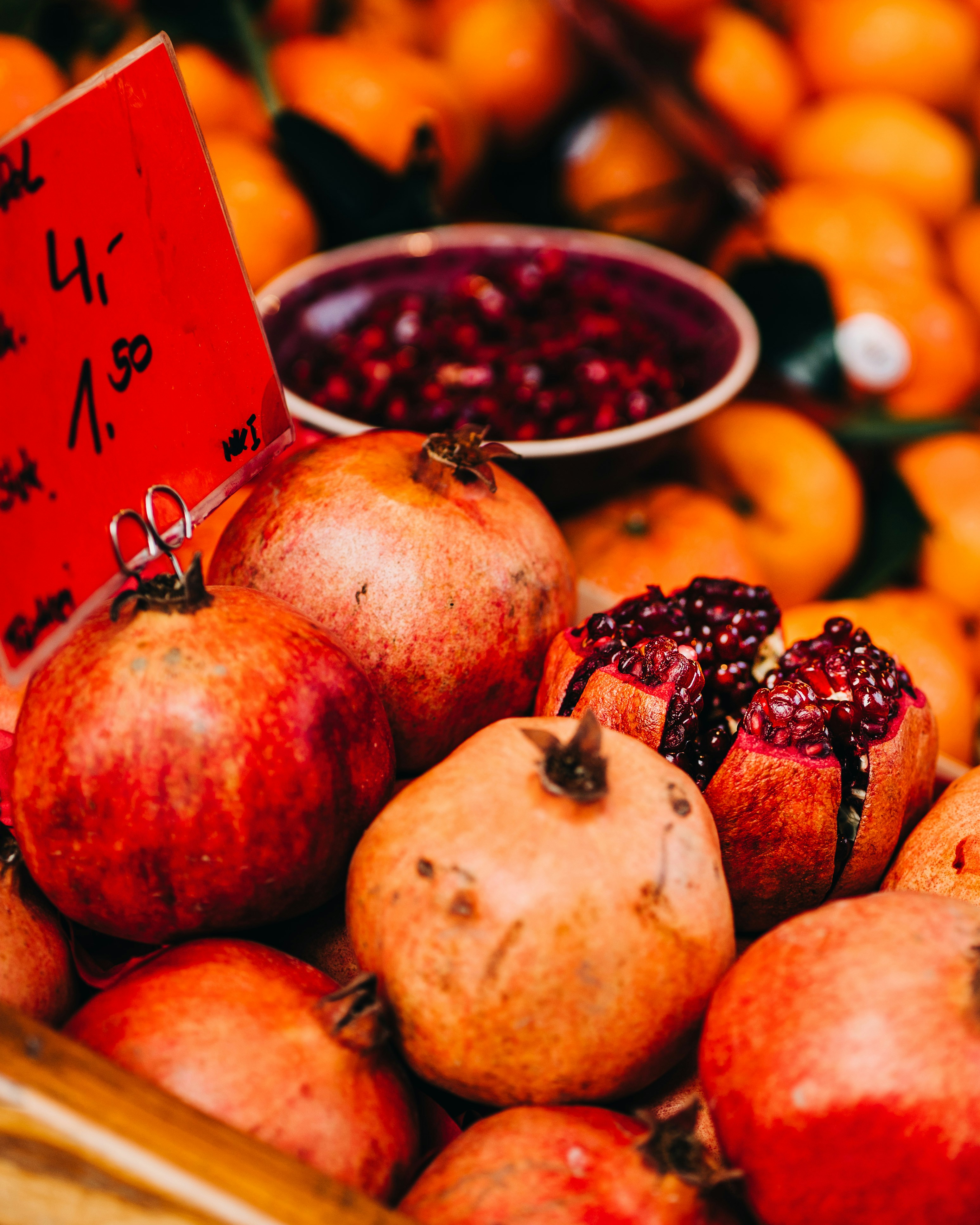 Fresh Pomegranates at Market Stall