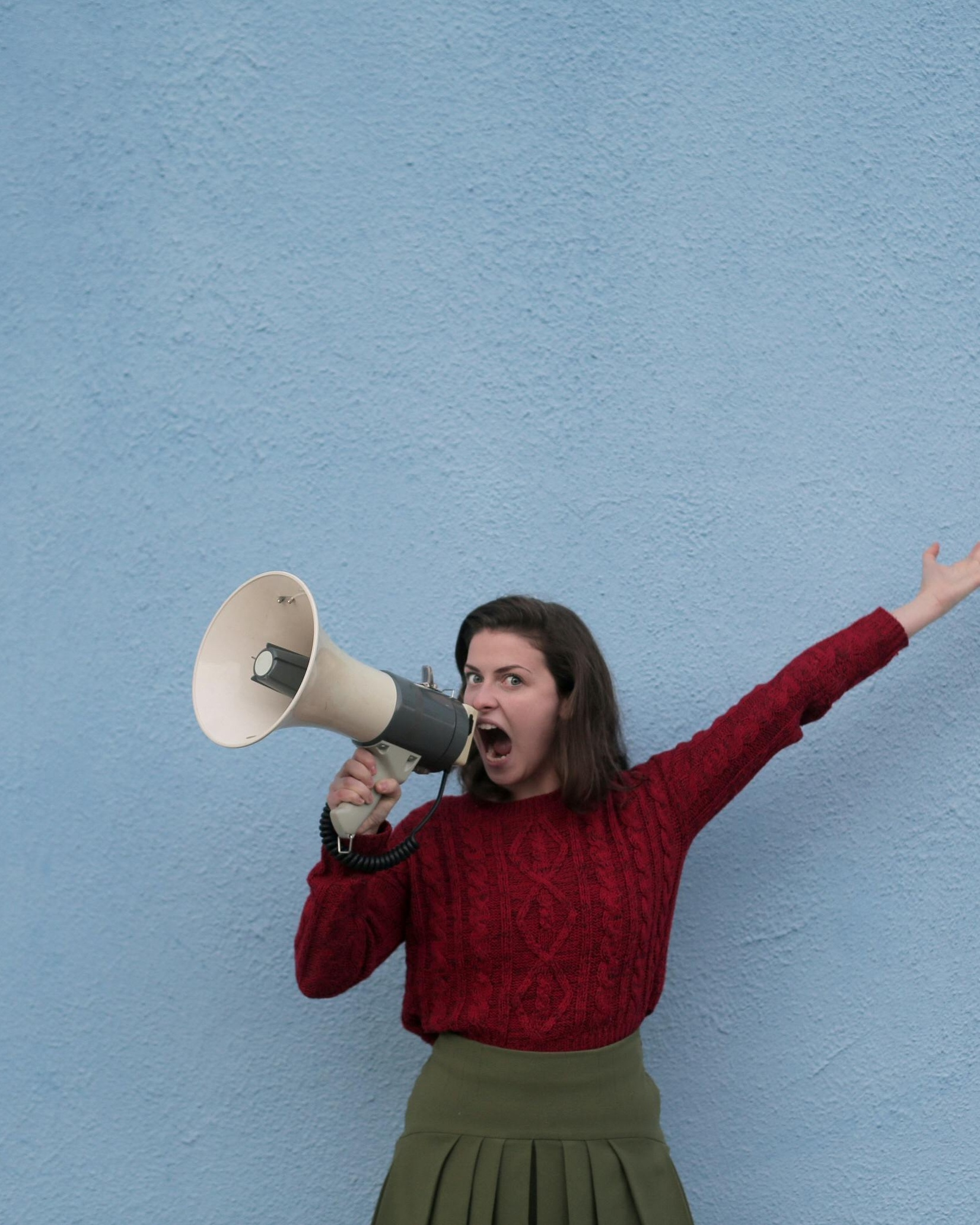 Woman Shouting With Megaphone