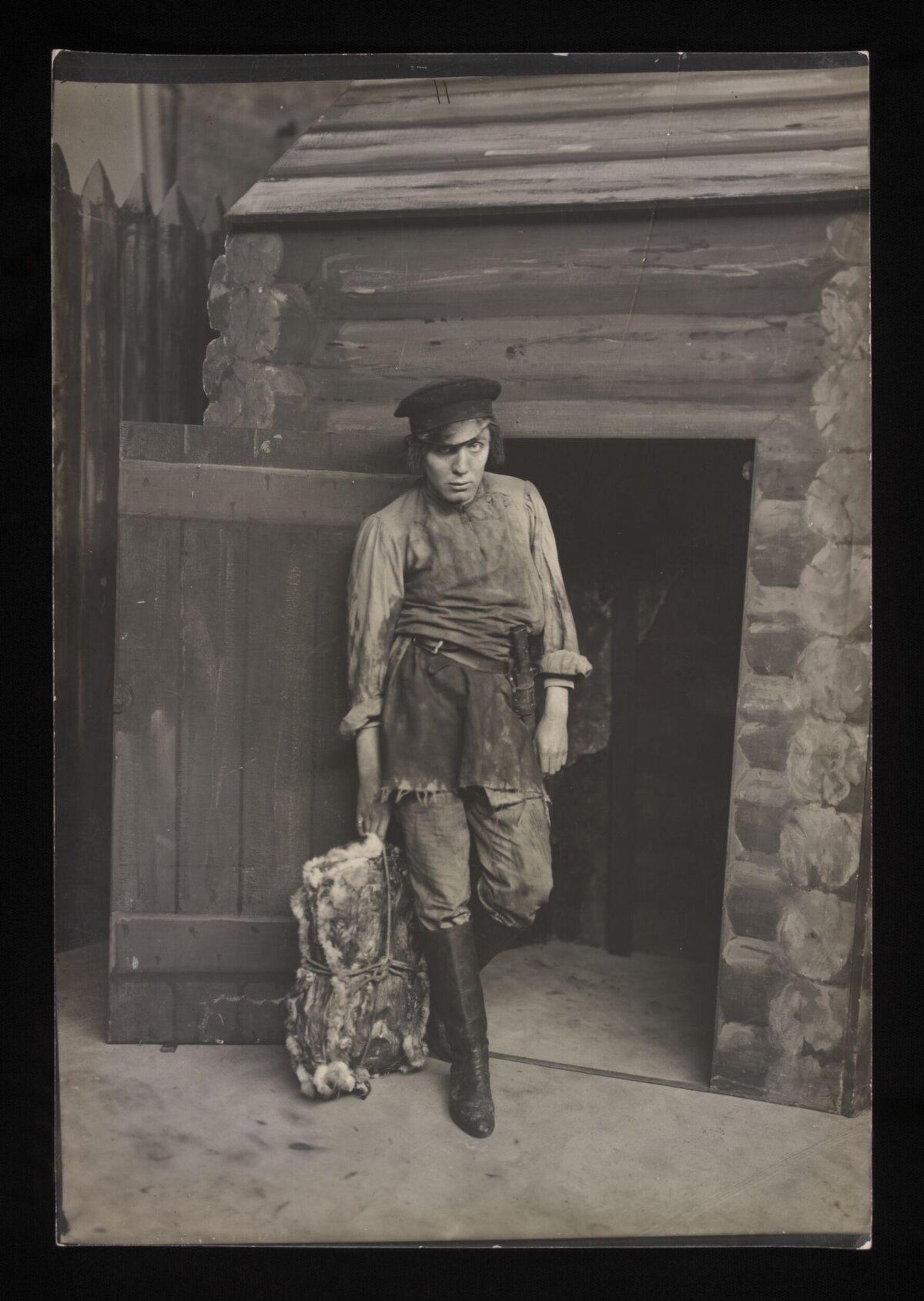 Vintage Portrait of Fur Peddler at Cabin Door