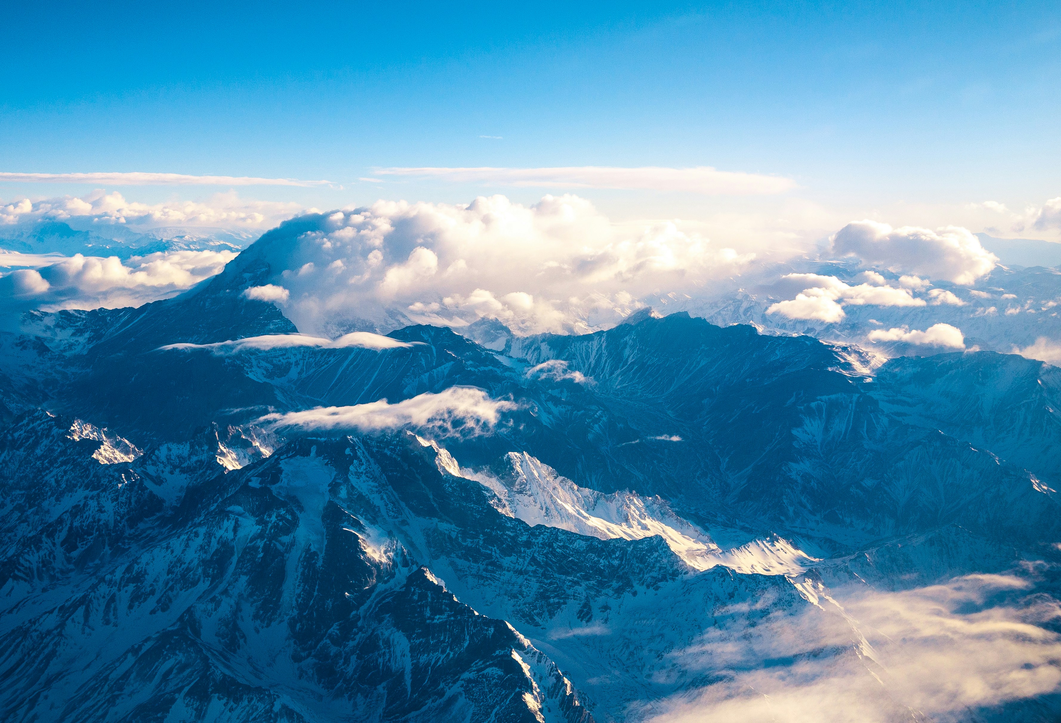 Aerial View of Snow-capped Mountains
