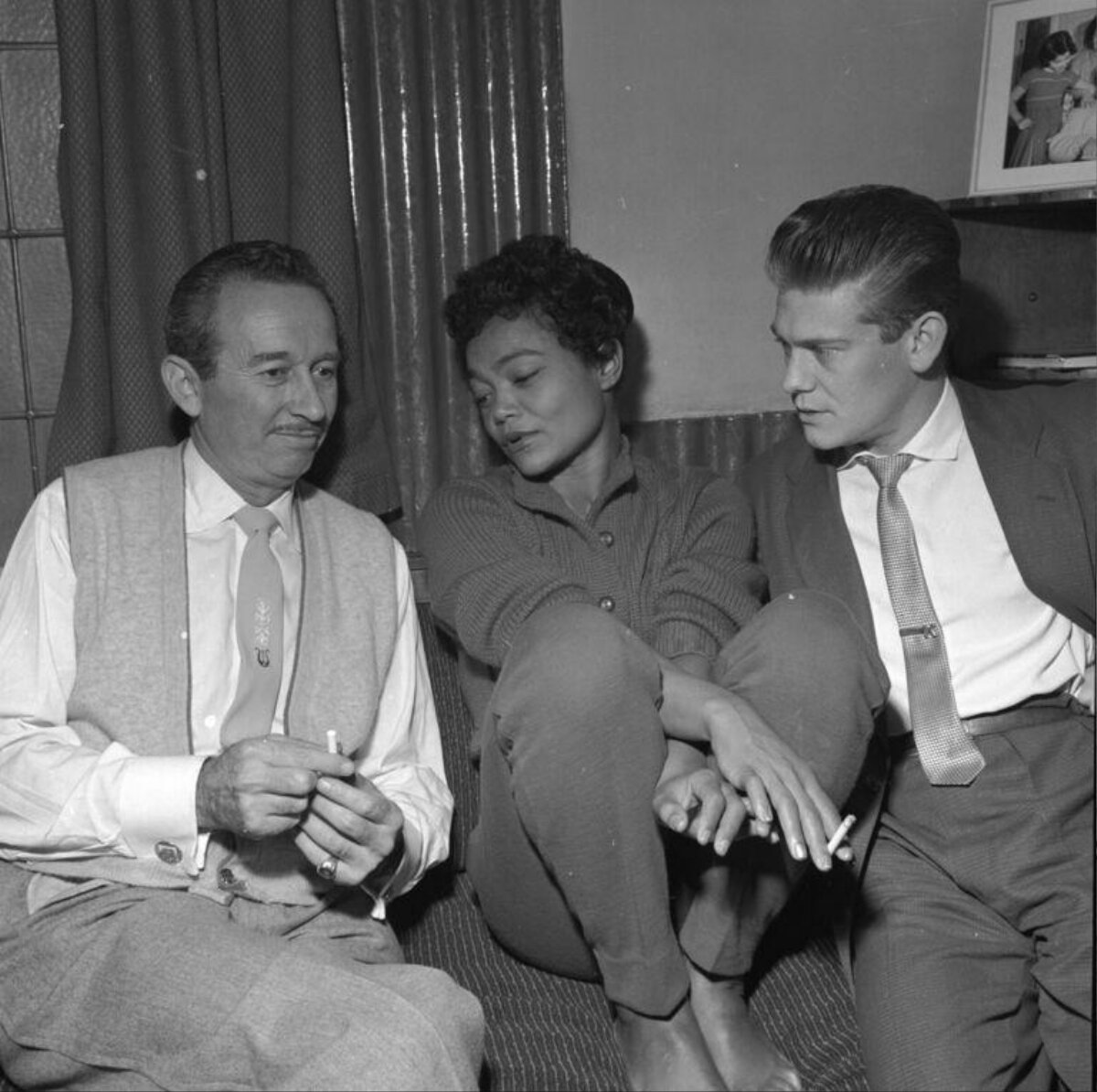Three People Chatting On Couch