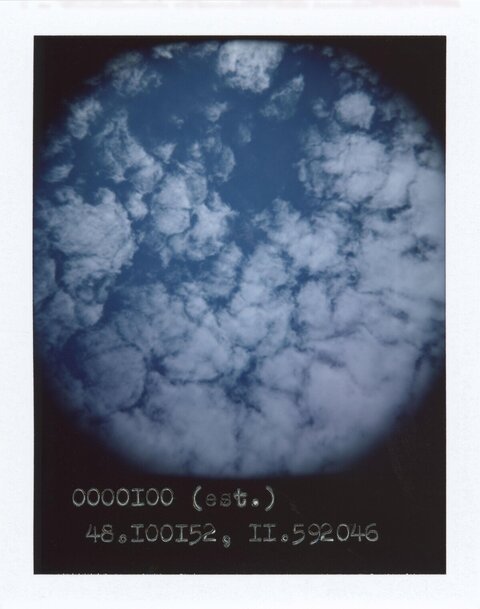 Polaroid Capture of Sky and Clouds