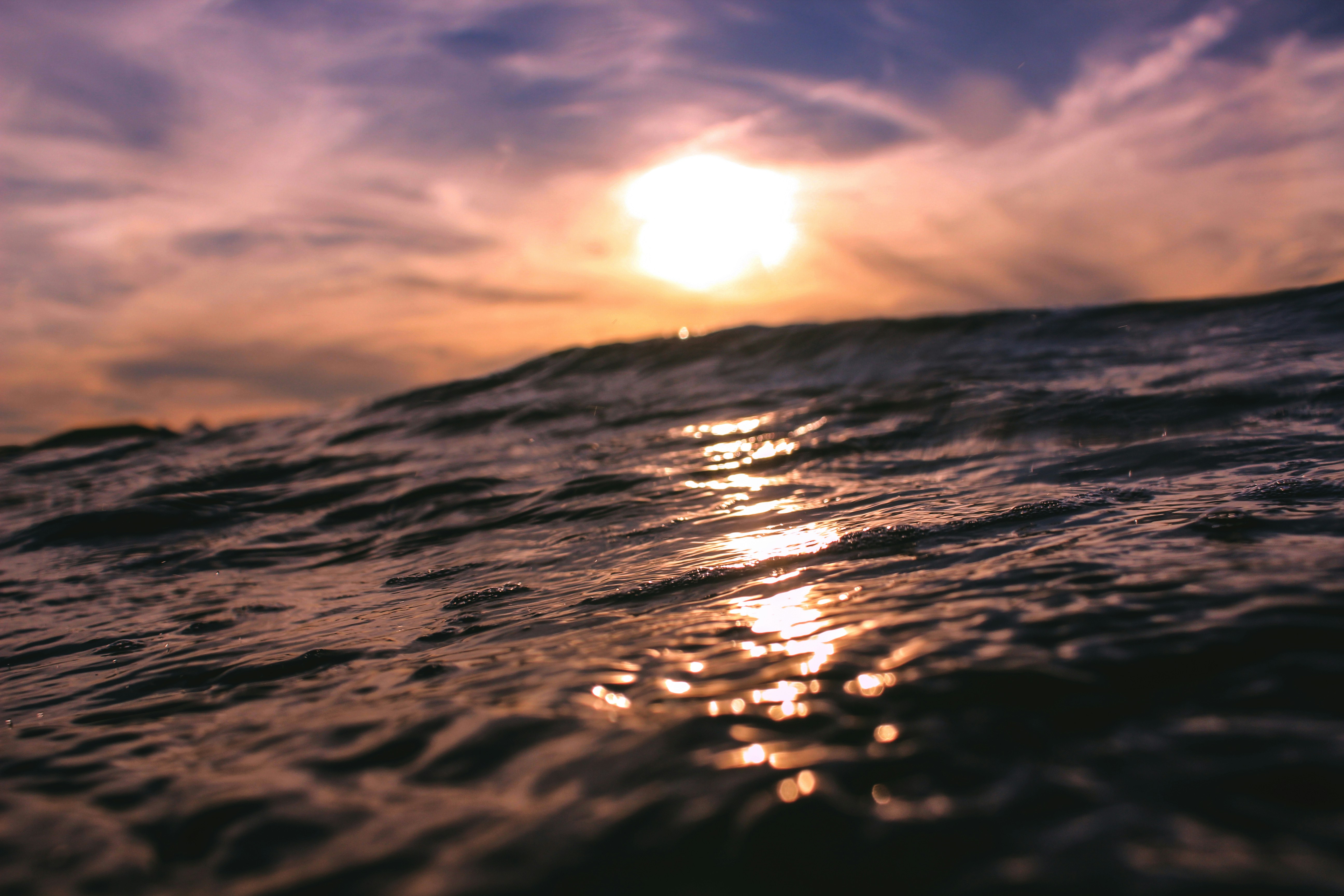 Sunset Over Ocean Waves