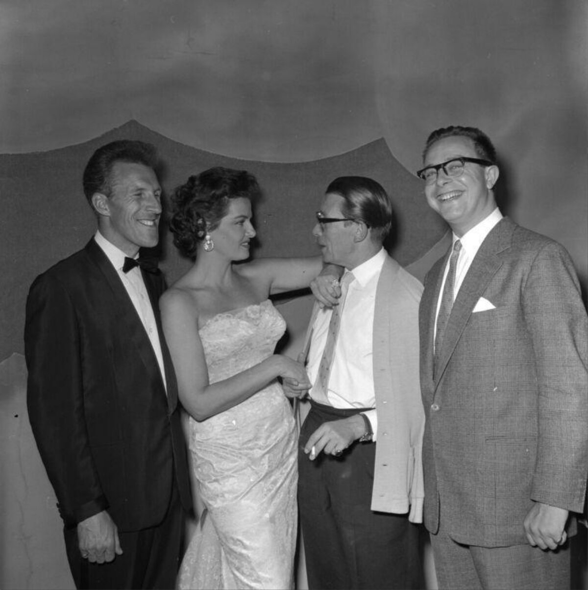 Four People at Formal Social Gathering