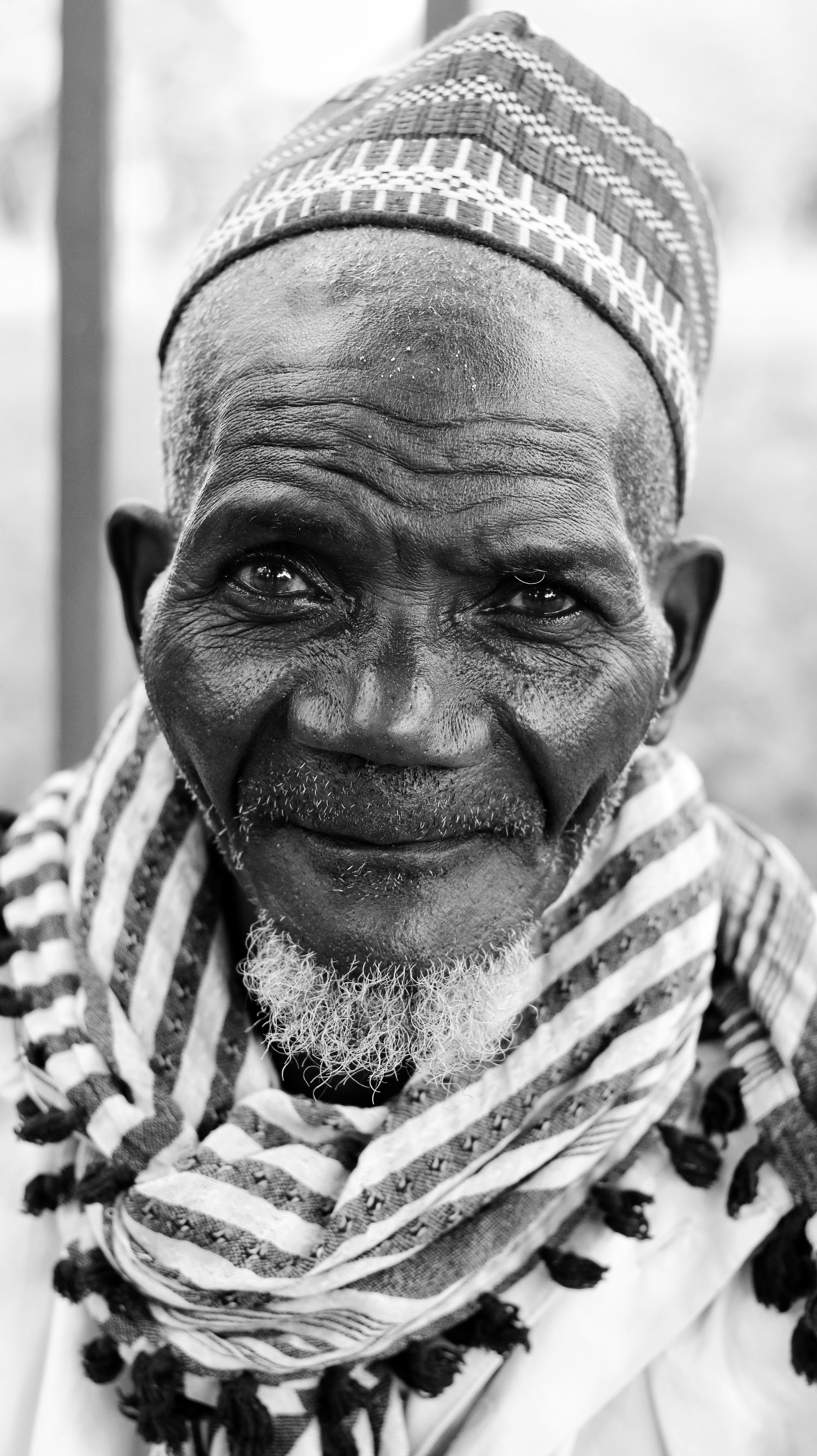 Portrait of Elderly Man in Traditional Headwear
