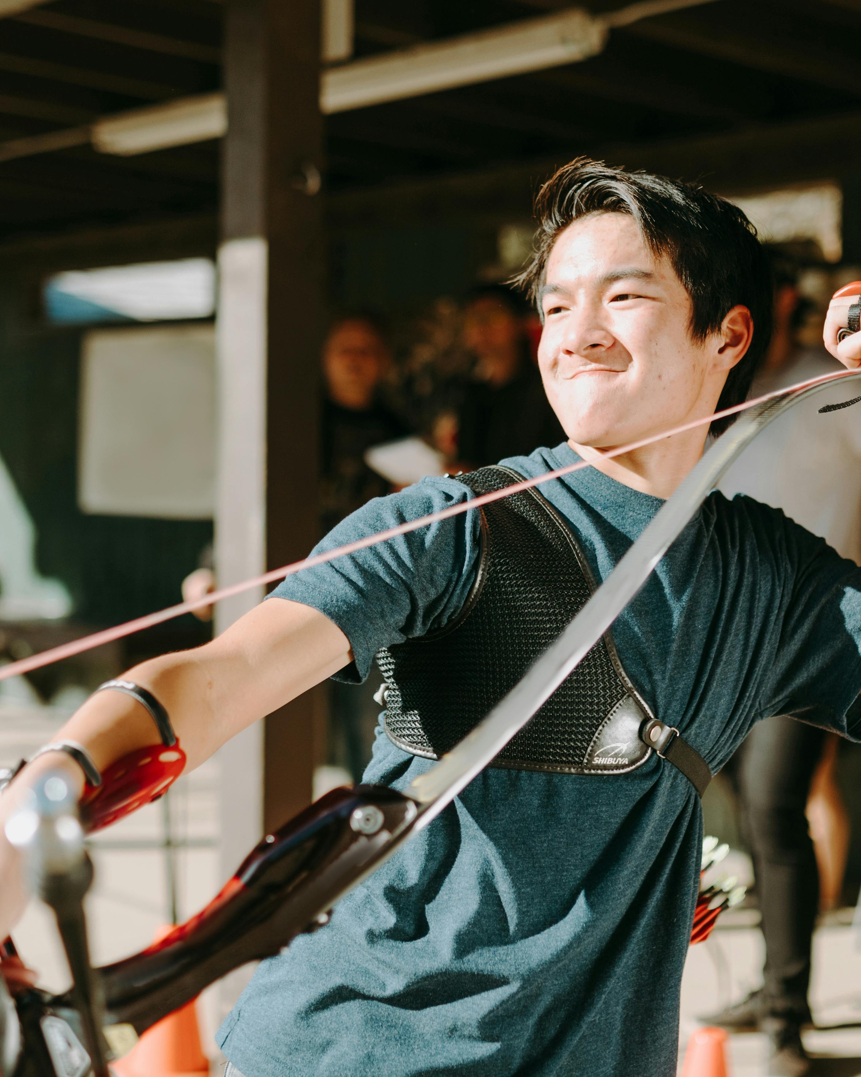 Young Man Practicing Archery