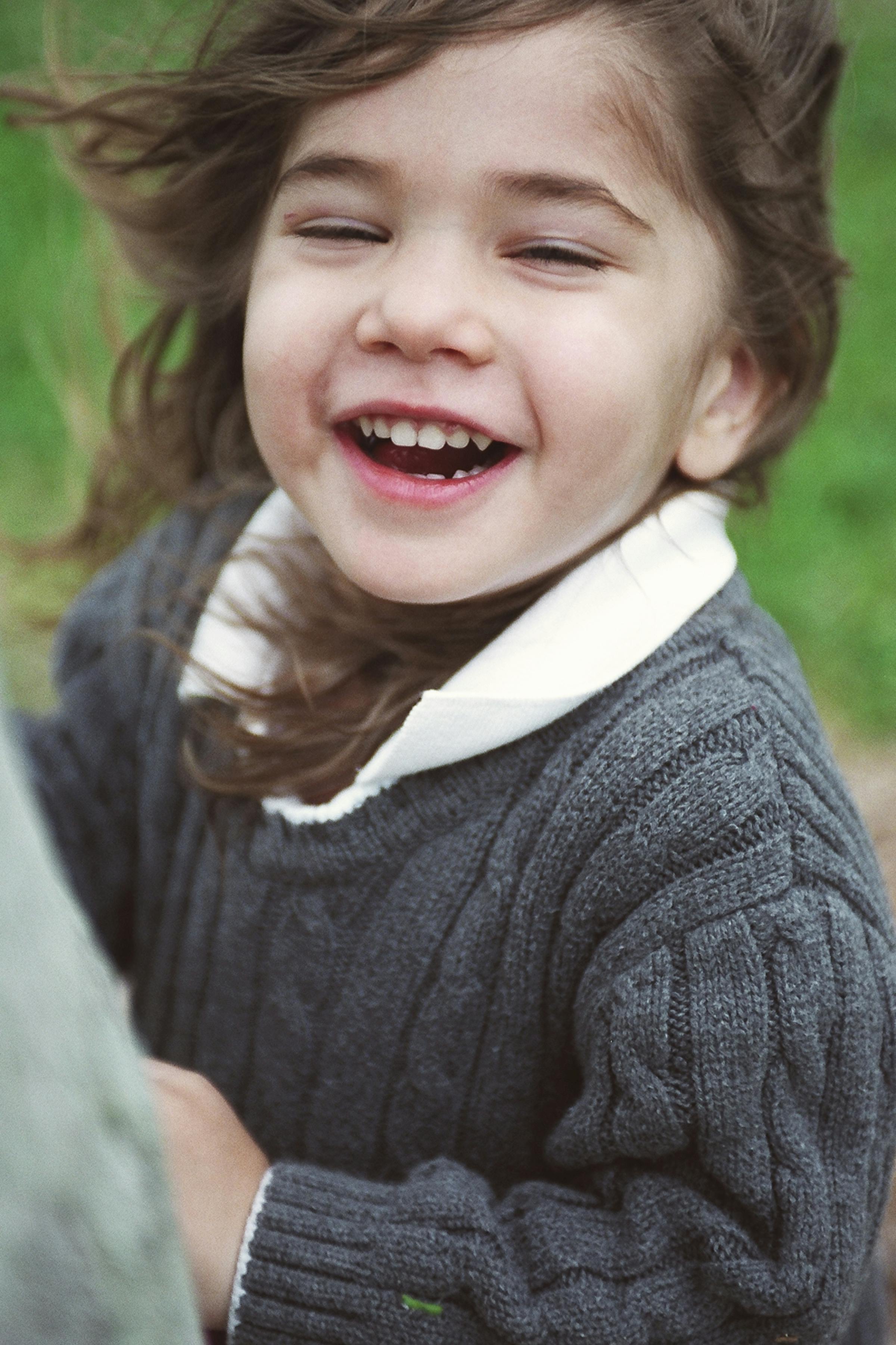 Laughing Little Girl Outdoors