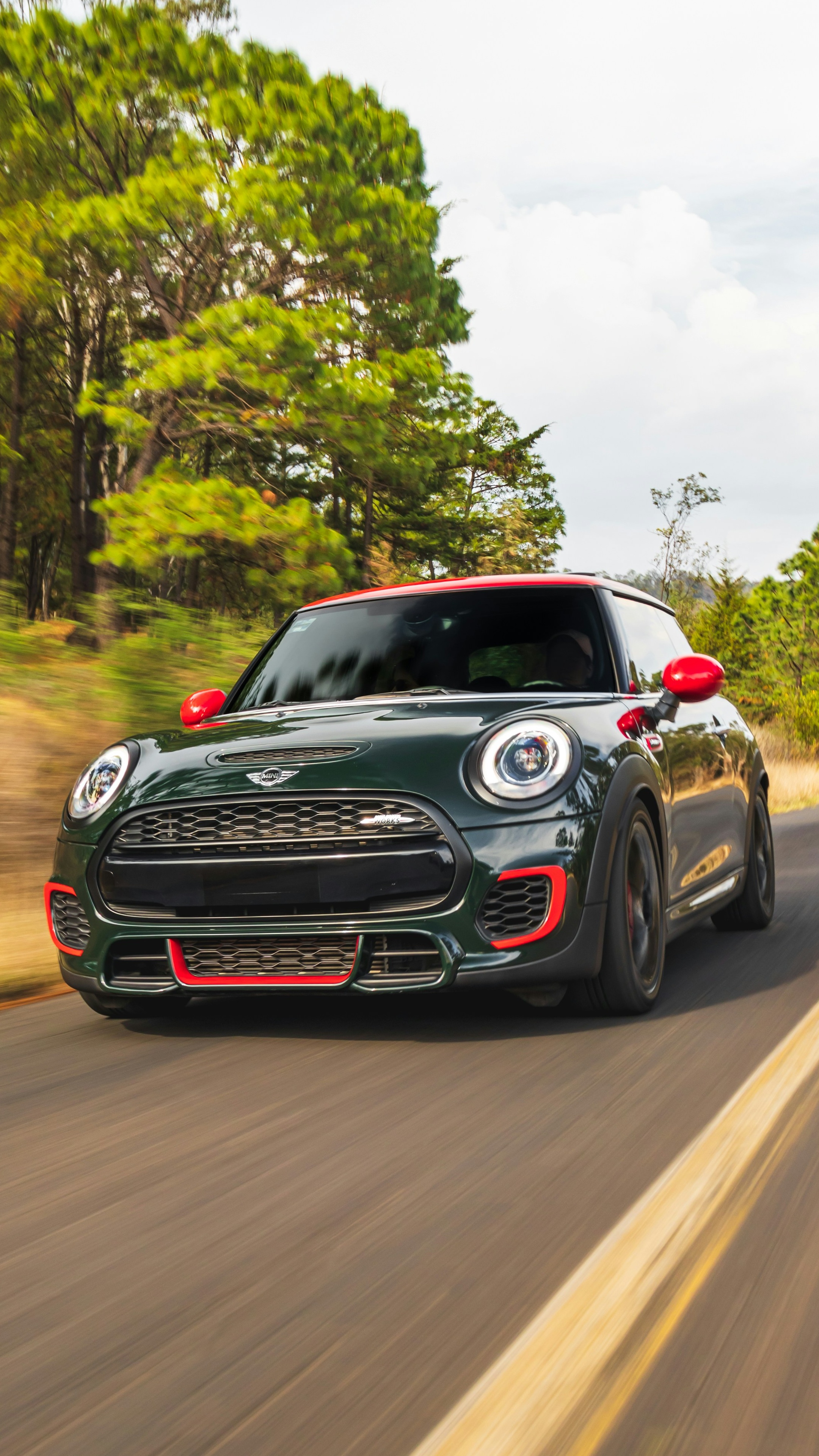Mini Cooper Driving on Forest Road — Cars