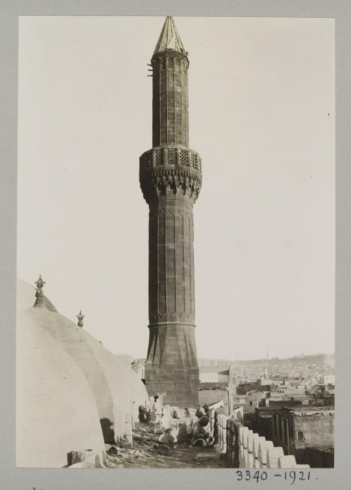 Vintage Islamic Minaret and Cityscape