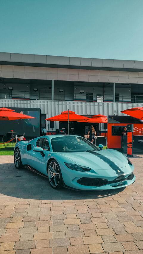 Light Blue Ferrari at Outdoor Event