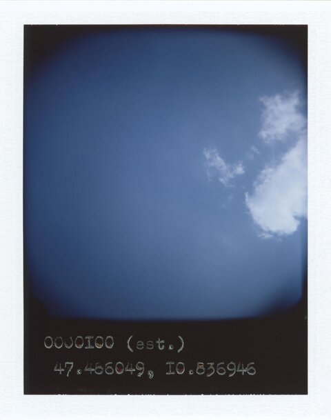 Polaroid Shot of Blue Sky With Clouds