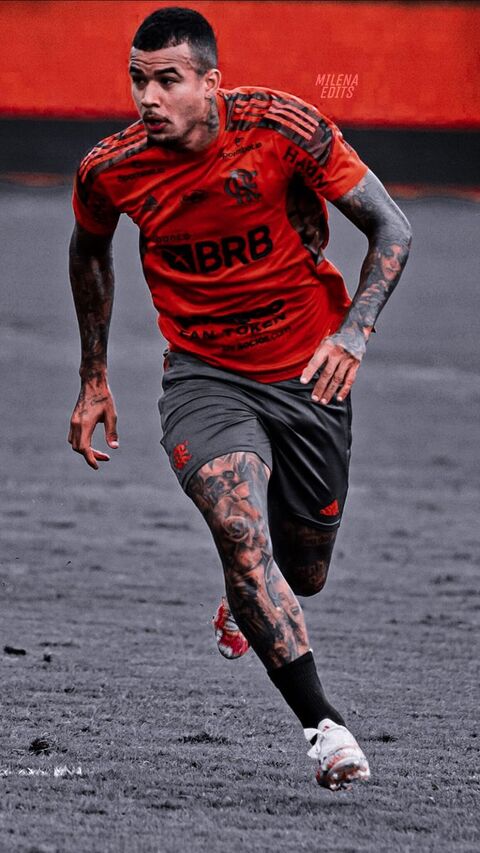 Tattooed Footballer Running In Training