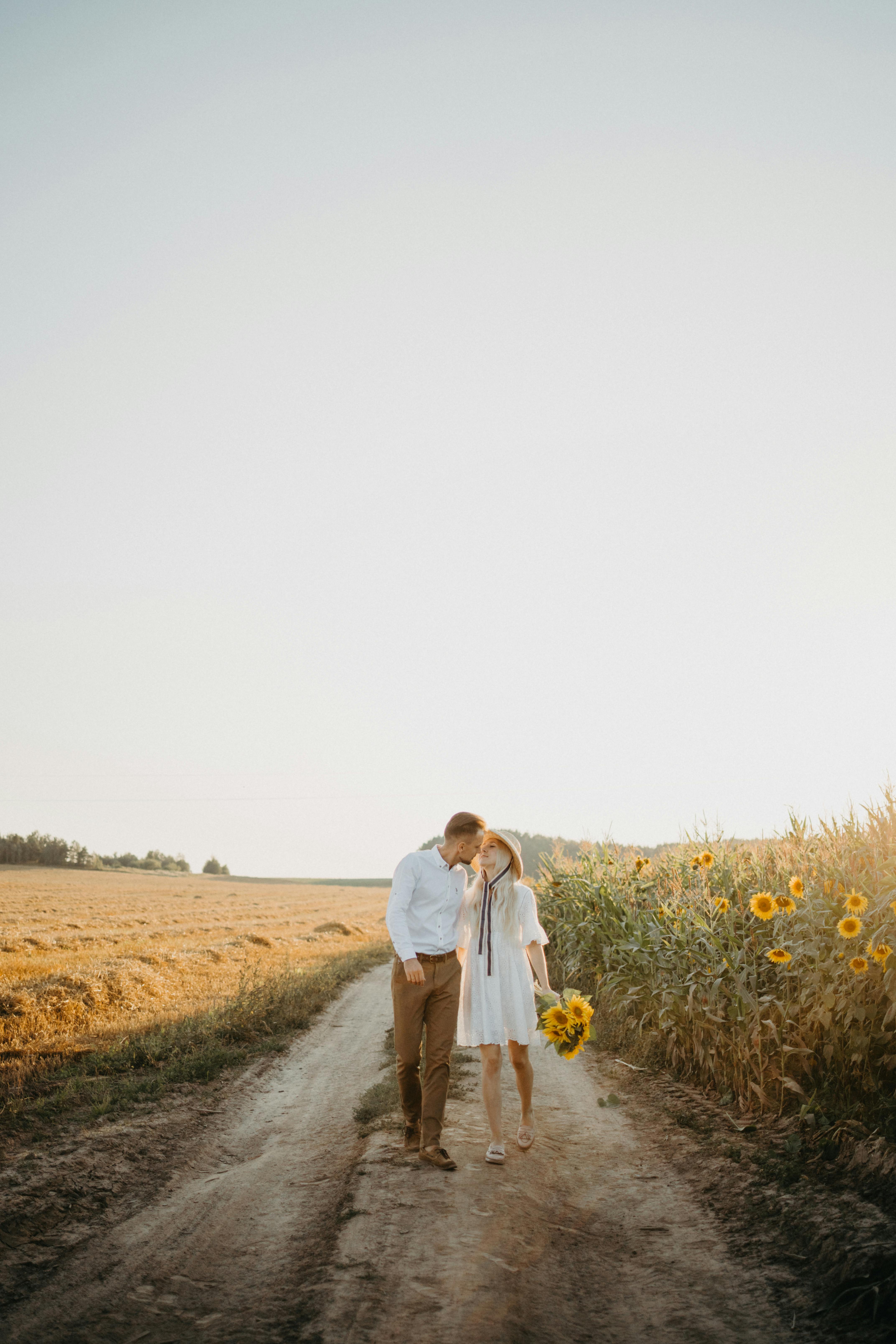 Couple Walking Along Country Dirt Path
