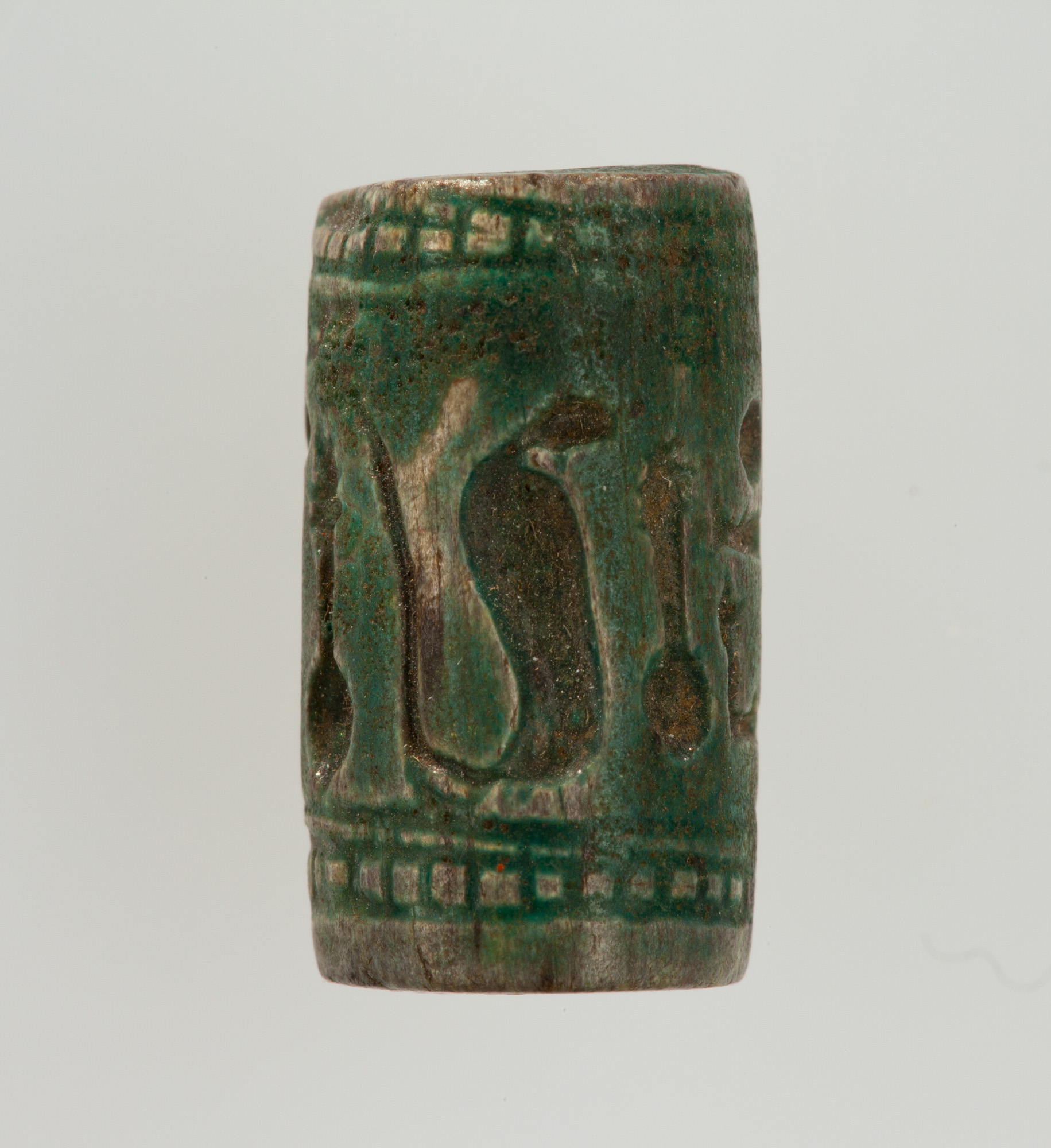 Ancient Green Carved Cylinder Artifact