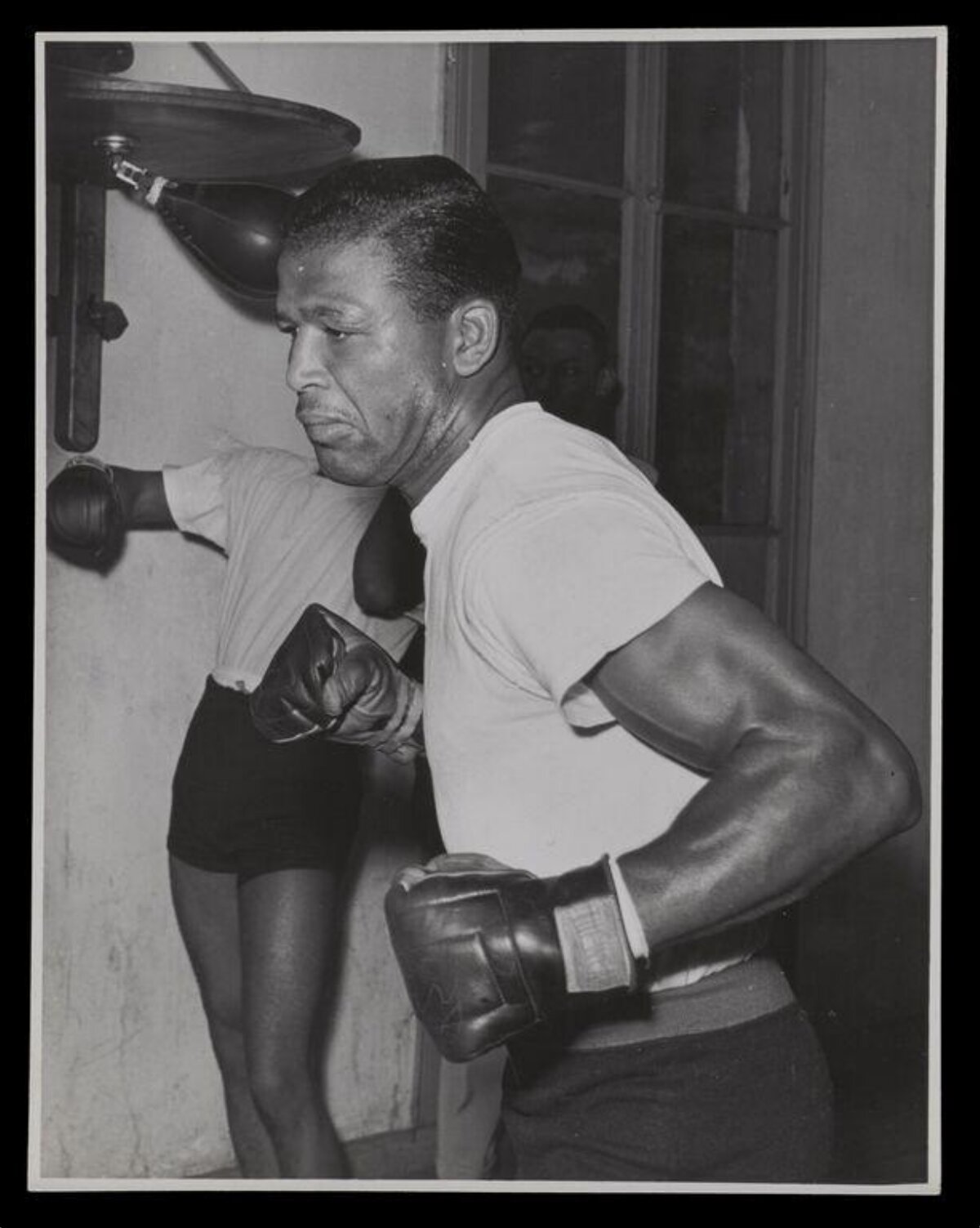 Black Boxer Training At Gym