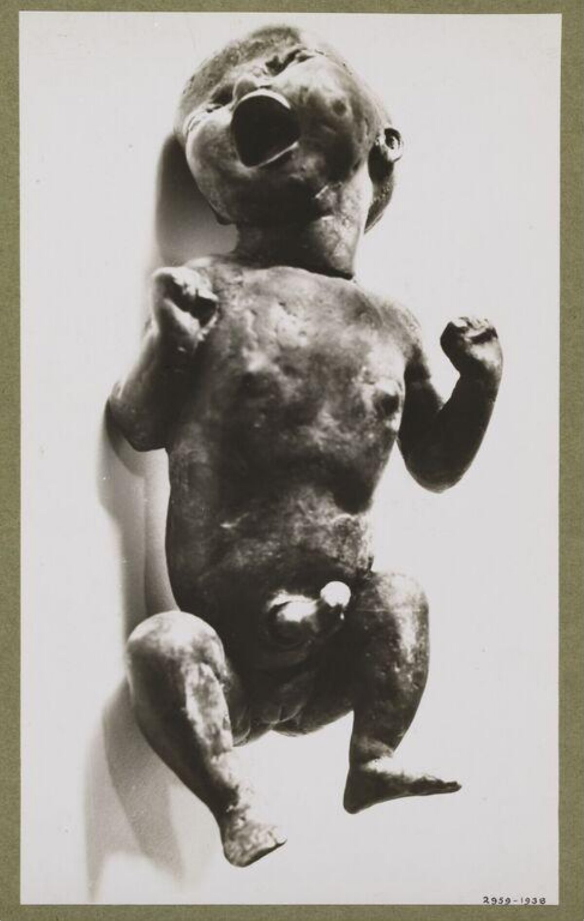 Ancient Bronze Infant Sculpture