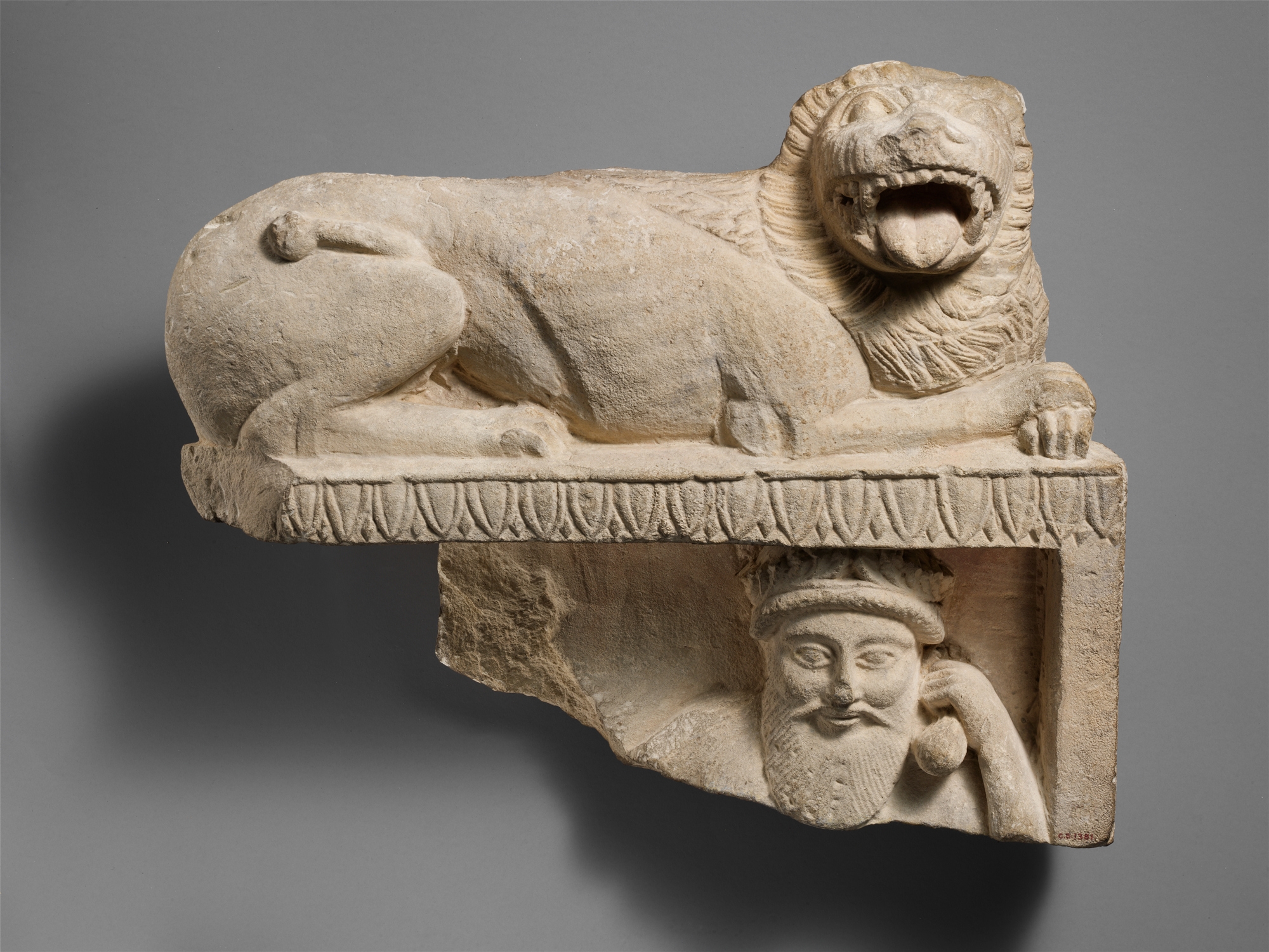 Ancient Stone Carving of Lion and Man