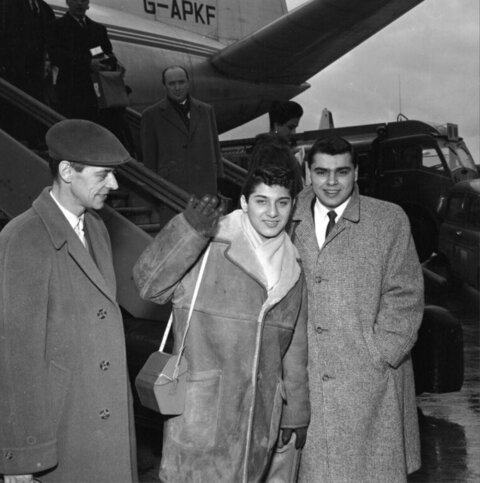 Three Men Posing At Airport Tarmac