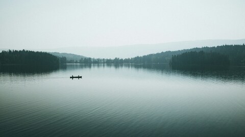 Misty Lake Canoe Scene