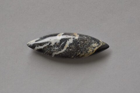 Polished Double-pointed Stone Artifact