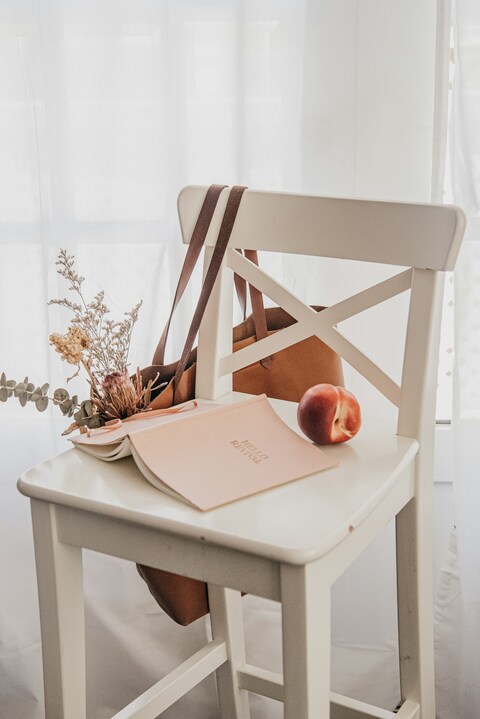 Cozy Still Life on White Chair