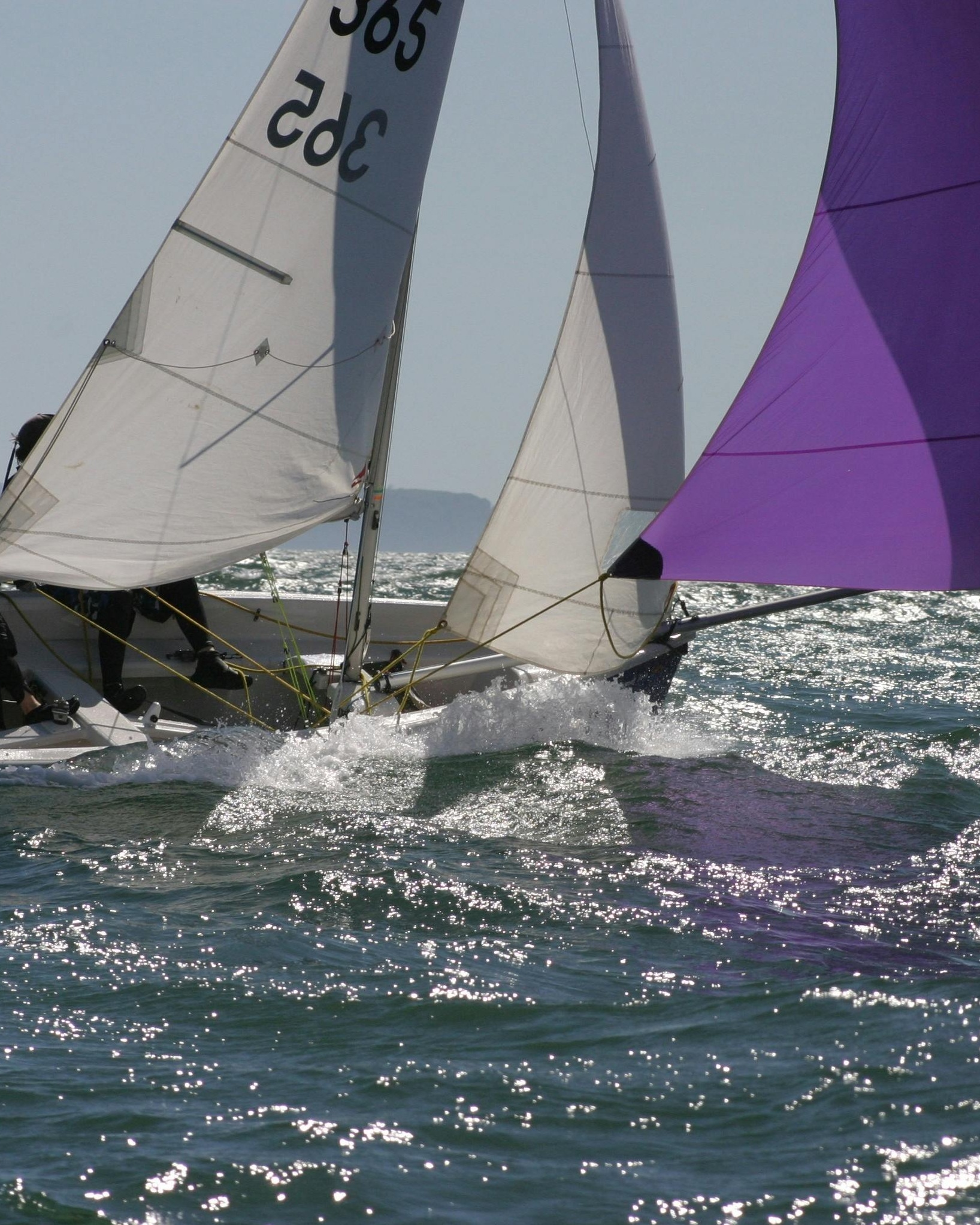 Sailboat Race on Choppy Open Sea